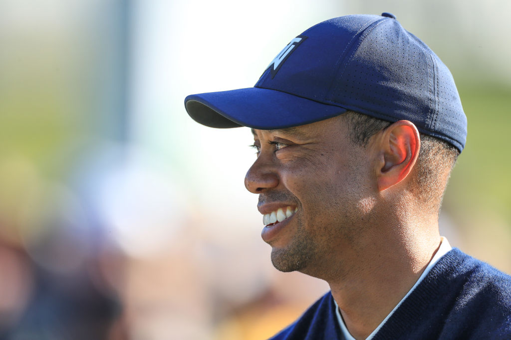 Tiger Woods waits to play his tee shot