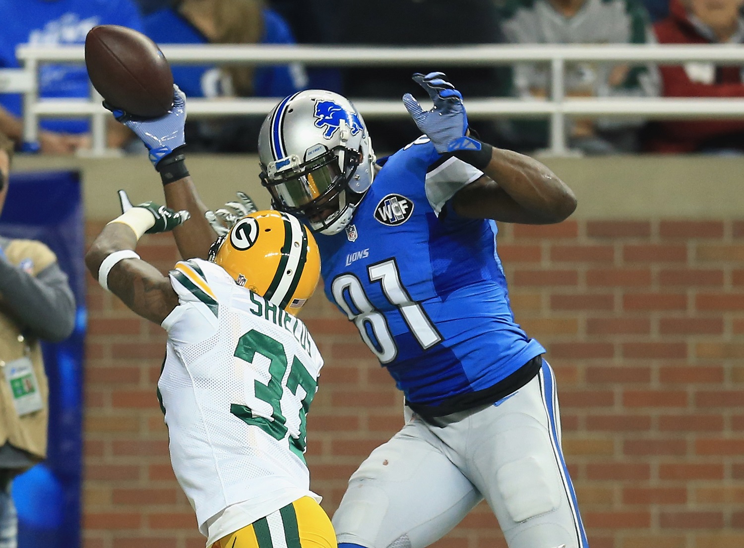 Receiver Calvin Johnson holds the NFL record for receiving yards in a season. | Andrew Weber/Getty Images