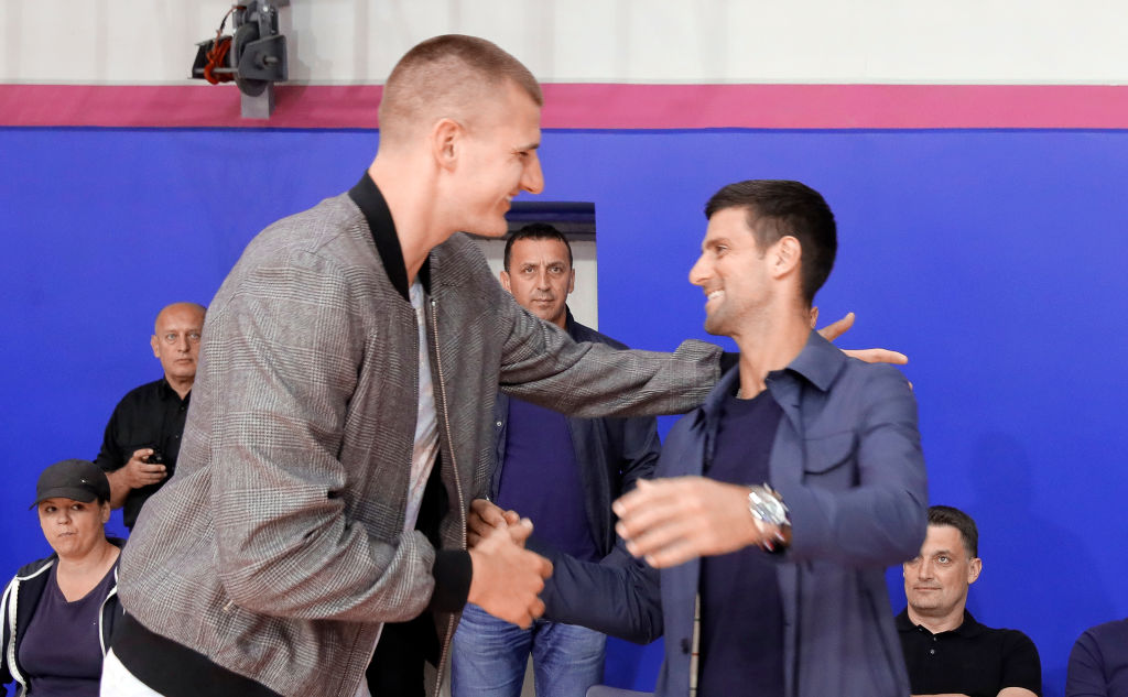 Denver Nuggets basketball player Nikola Jokic (L) of Serbia and Novak Djokovic of Serbia