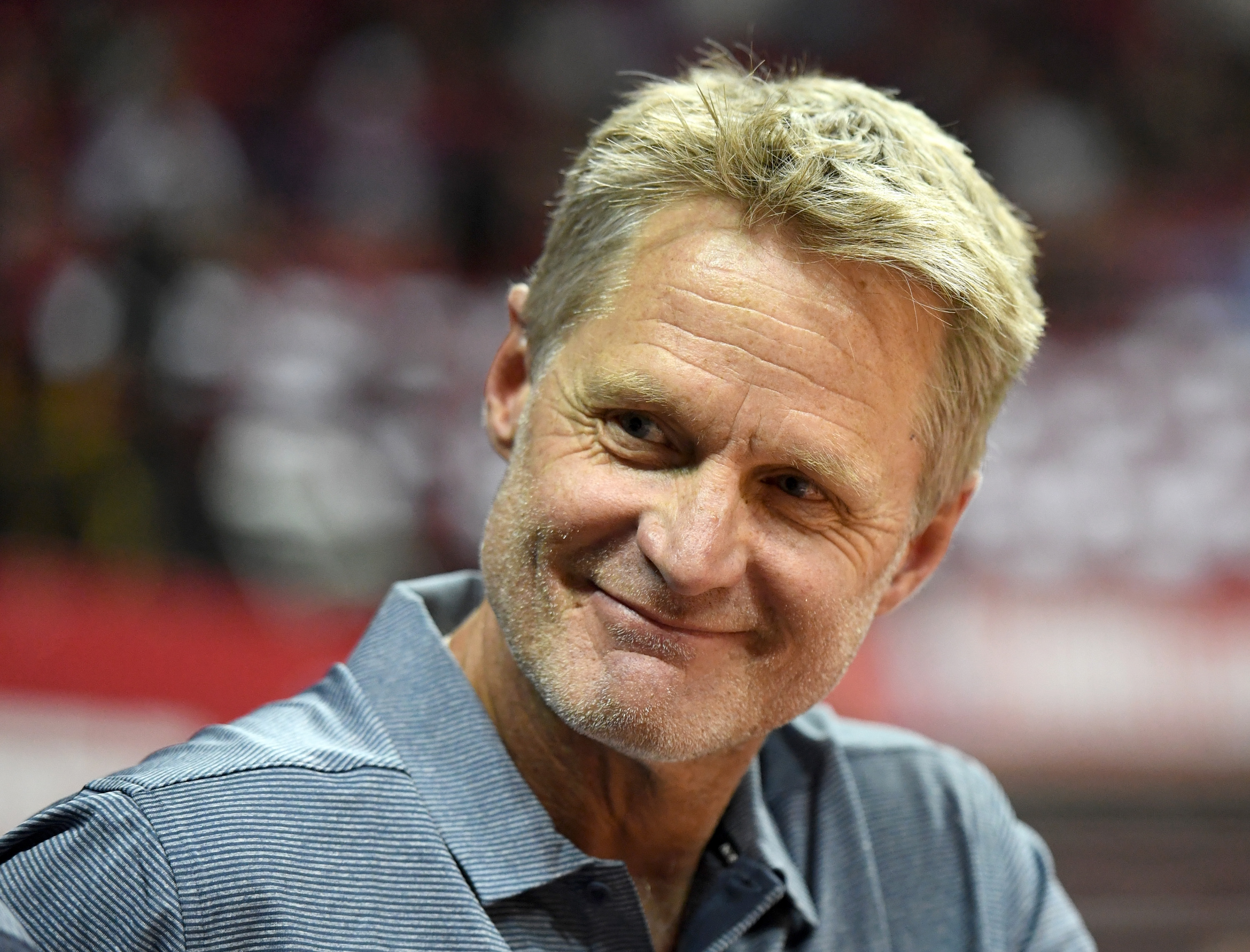 Head coach Steve Kerr of the Golden State Warriors smiles