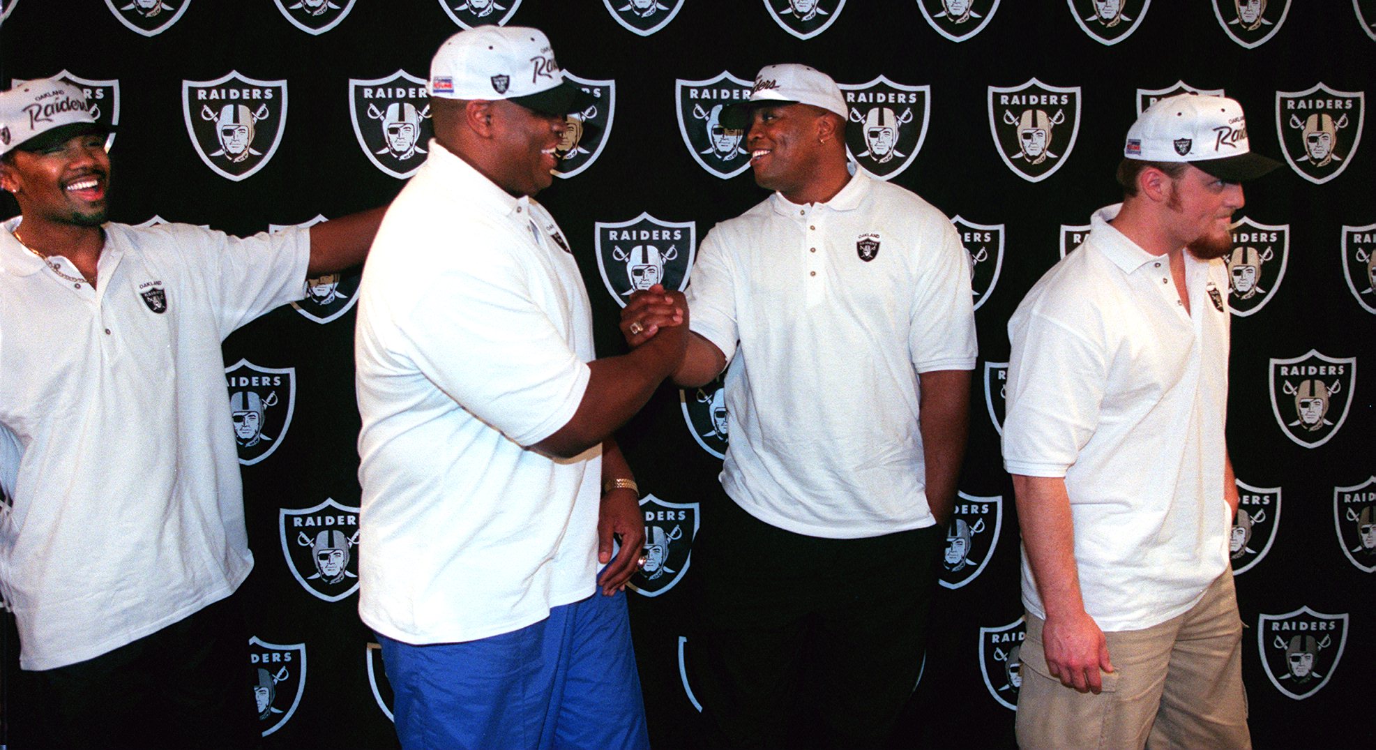 Leon Bender (second from right) died only weeks after he signed his first NFL contract with the Oakland Raiders in 1998.