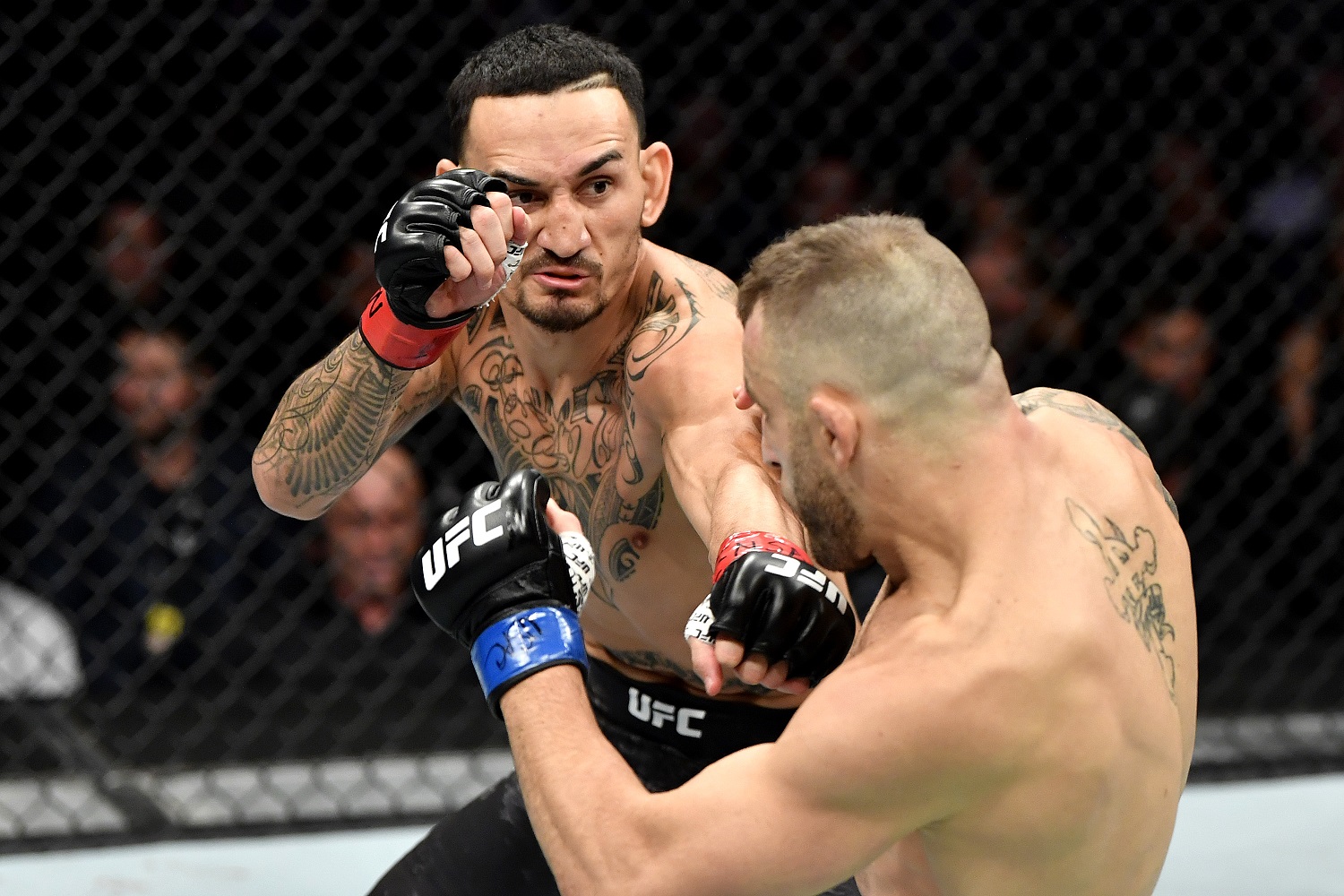 Max Holloway, left, lost his featherweight championship to Alexander Volkanovski last December in Las Vegas. | Jeff Bottari/Zuffa LLC/Getty Images