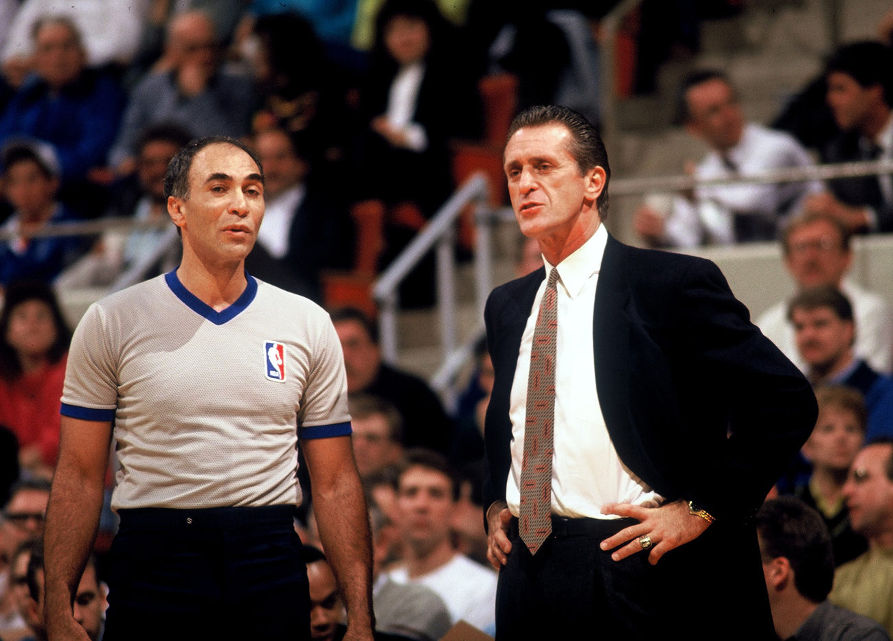Pat Riley coaching a game for the Knicks talking to a referee
