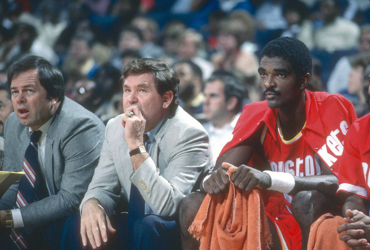 Ralph Sampson sits on the bench next to Bill Fitch