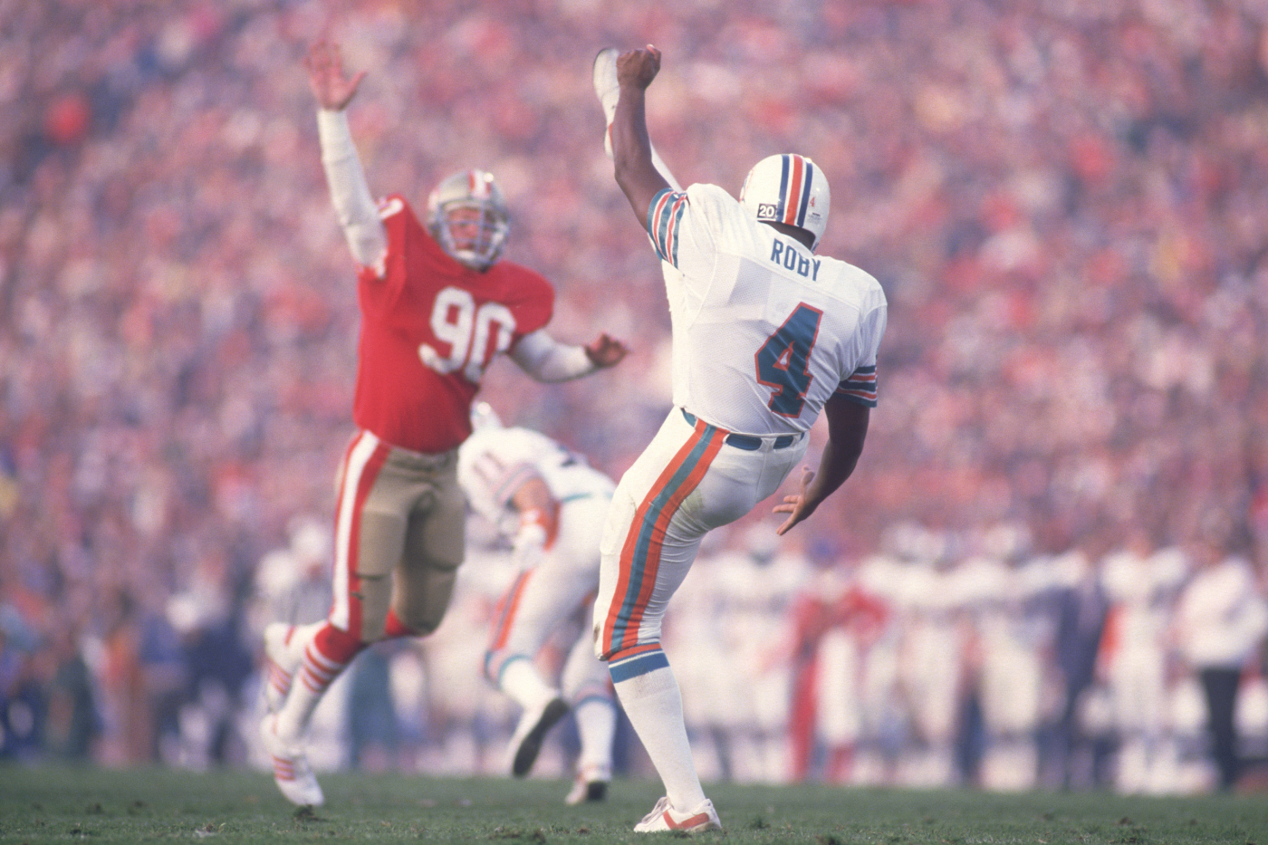 Reggie Roby was a very successful punter for the Miami Dolphins and broke down color barriers in the NFL. He, however, sadly died too young.