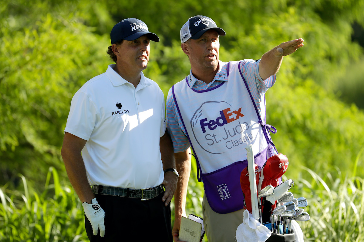 Golfer Phil Mickelson and caddie Jim Mackay in 2016