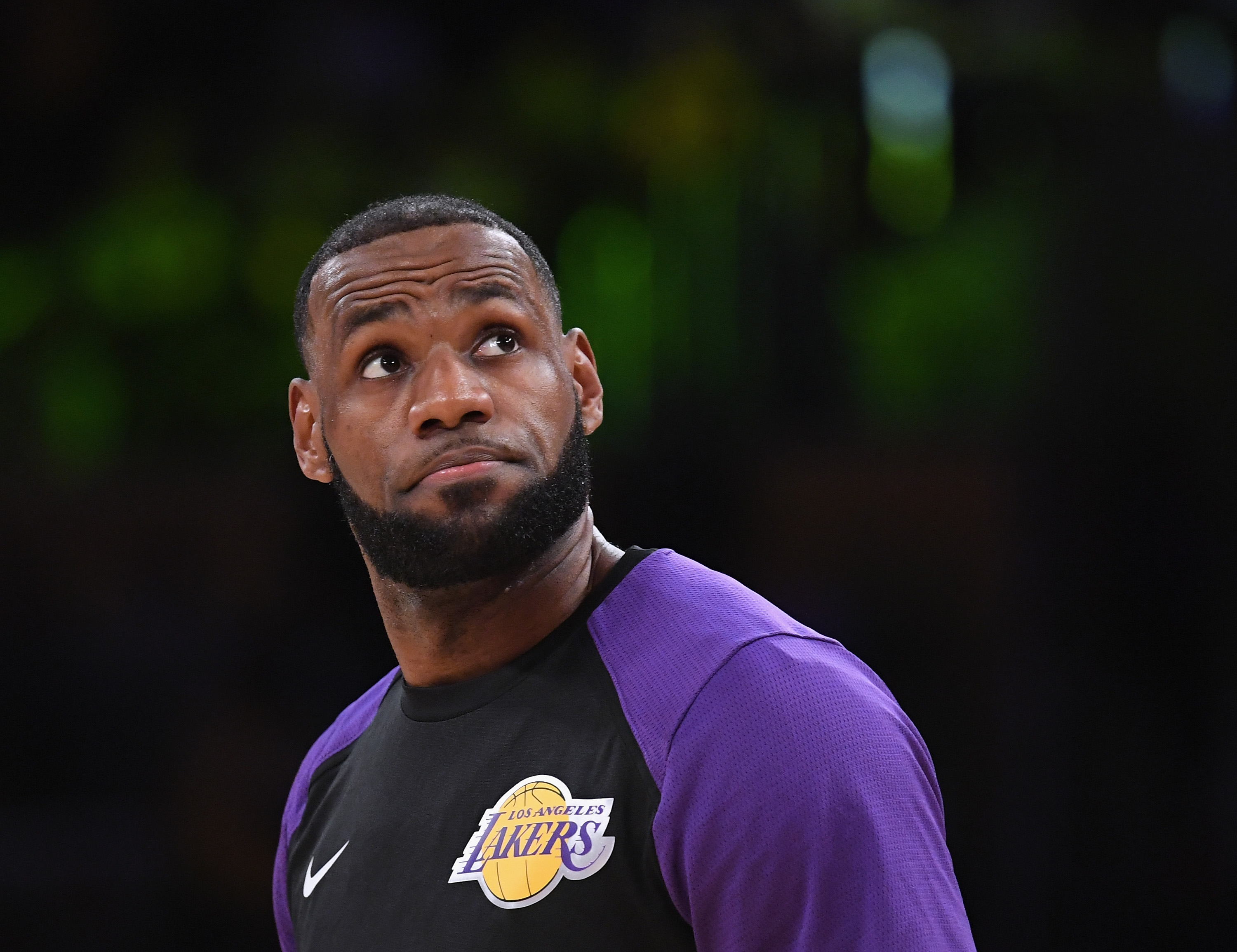 LeBron James looking on before the start of a Lakers game