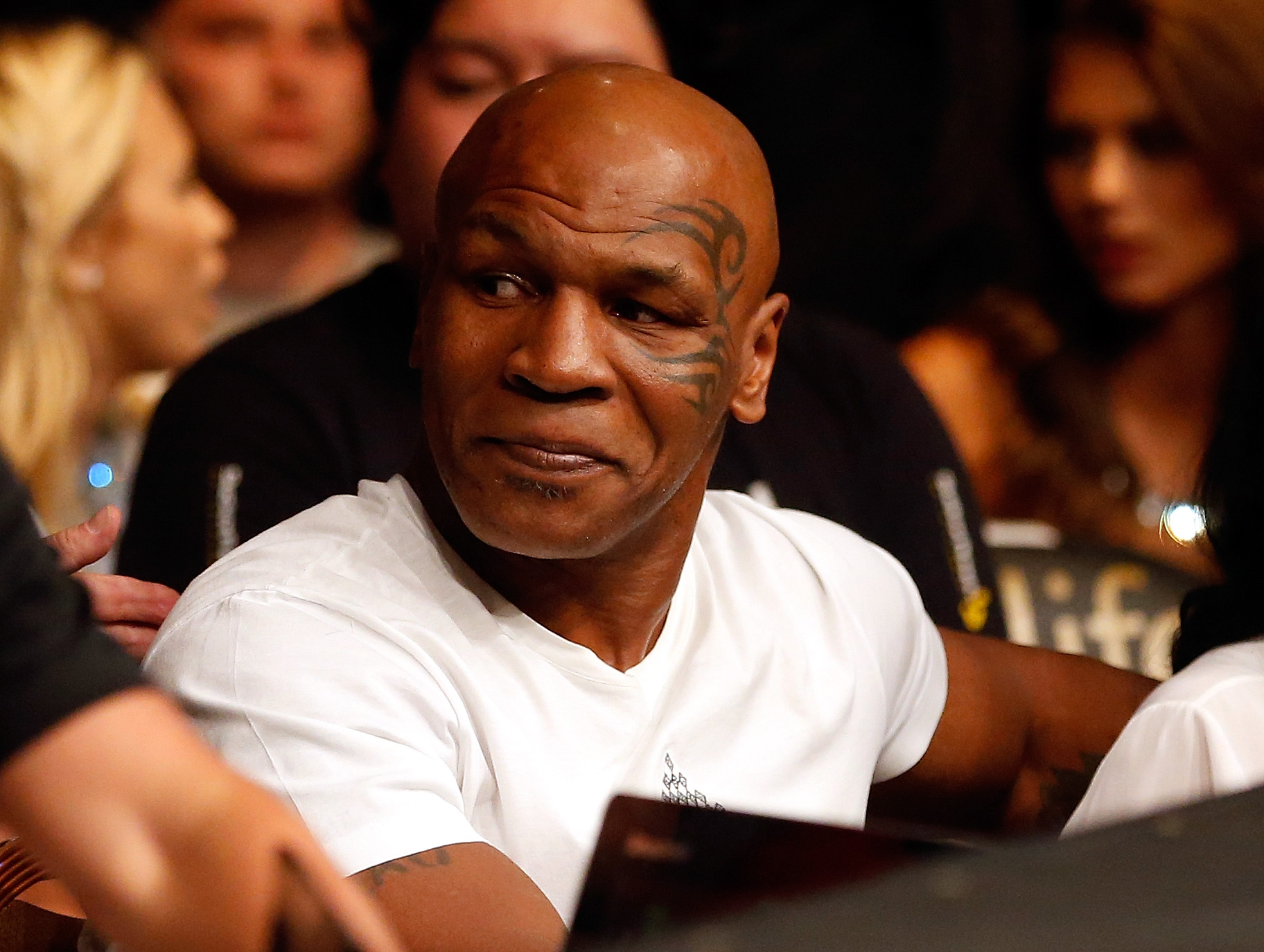 Mike Tyson attending a UFC fight