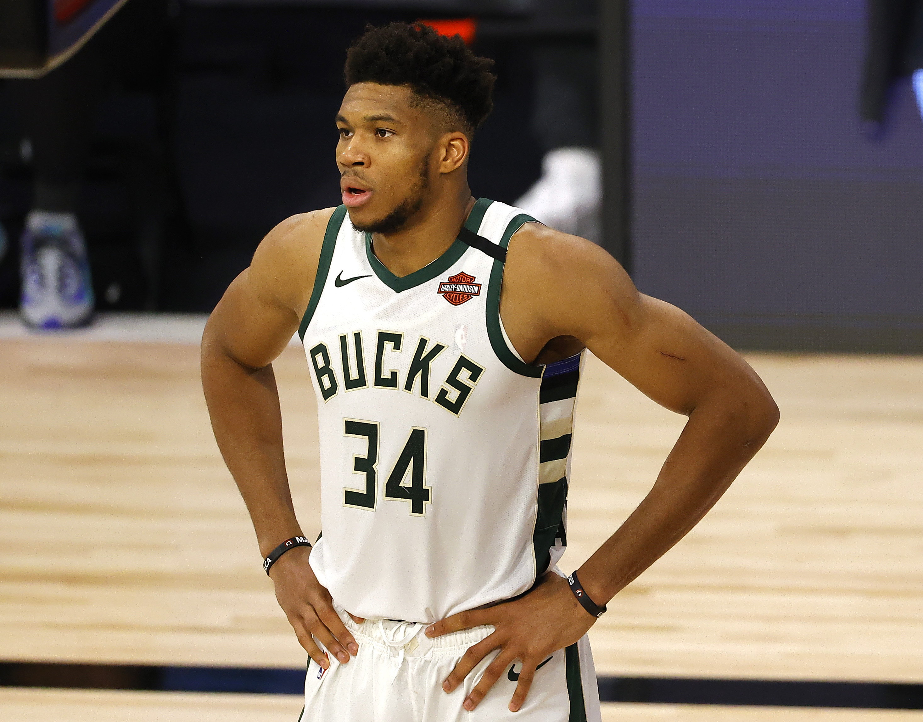 Giannis Antetokounmpo standing around during a Bucks playoff game