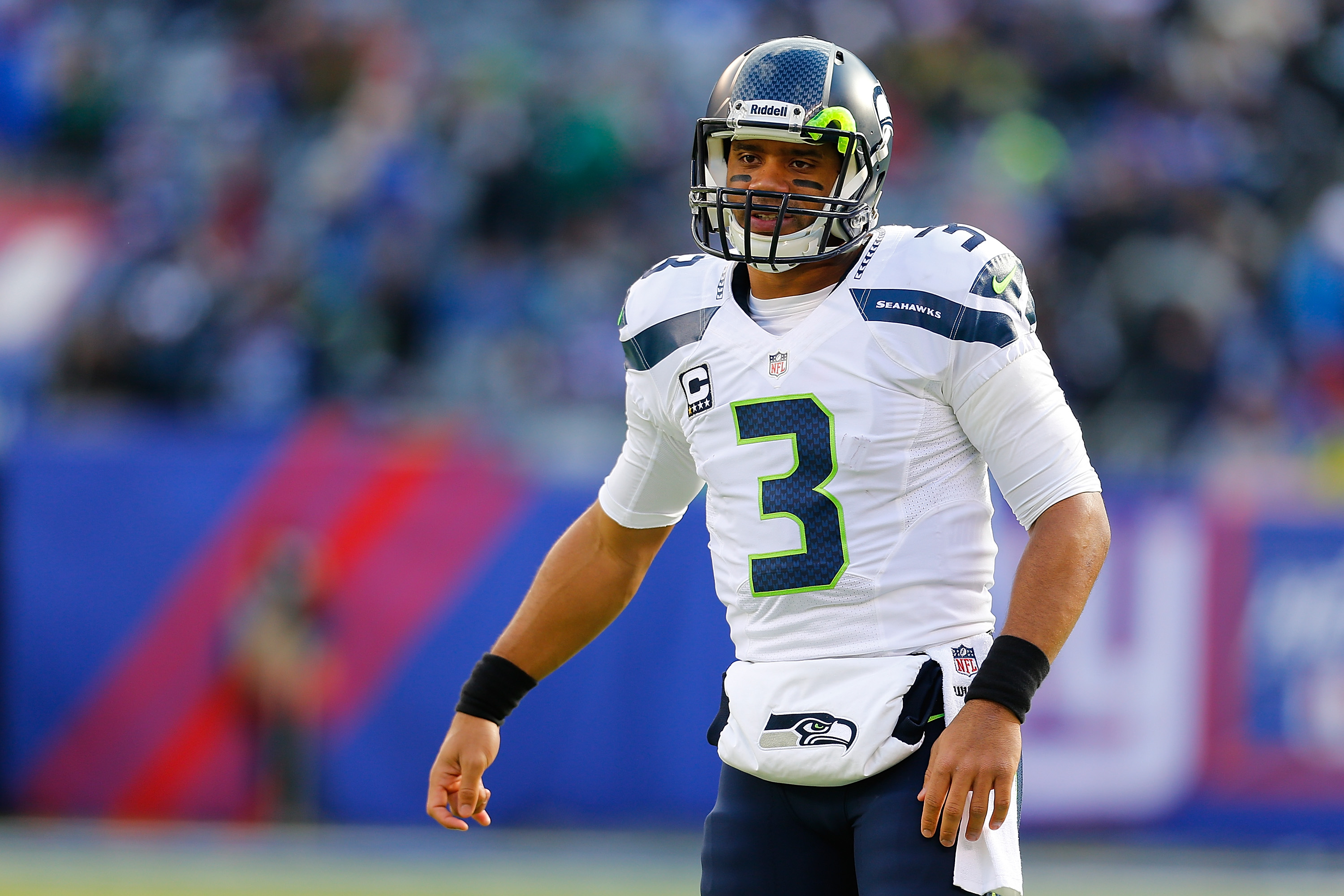 Russell Wilson looks on after a play during a Seahawks game