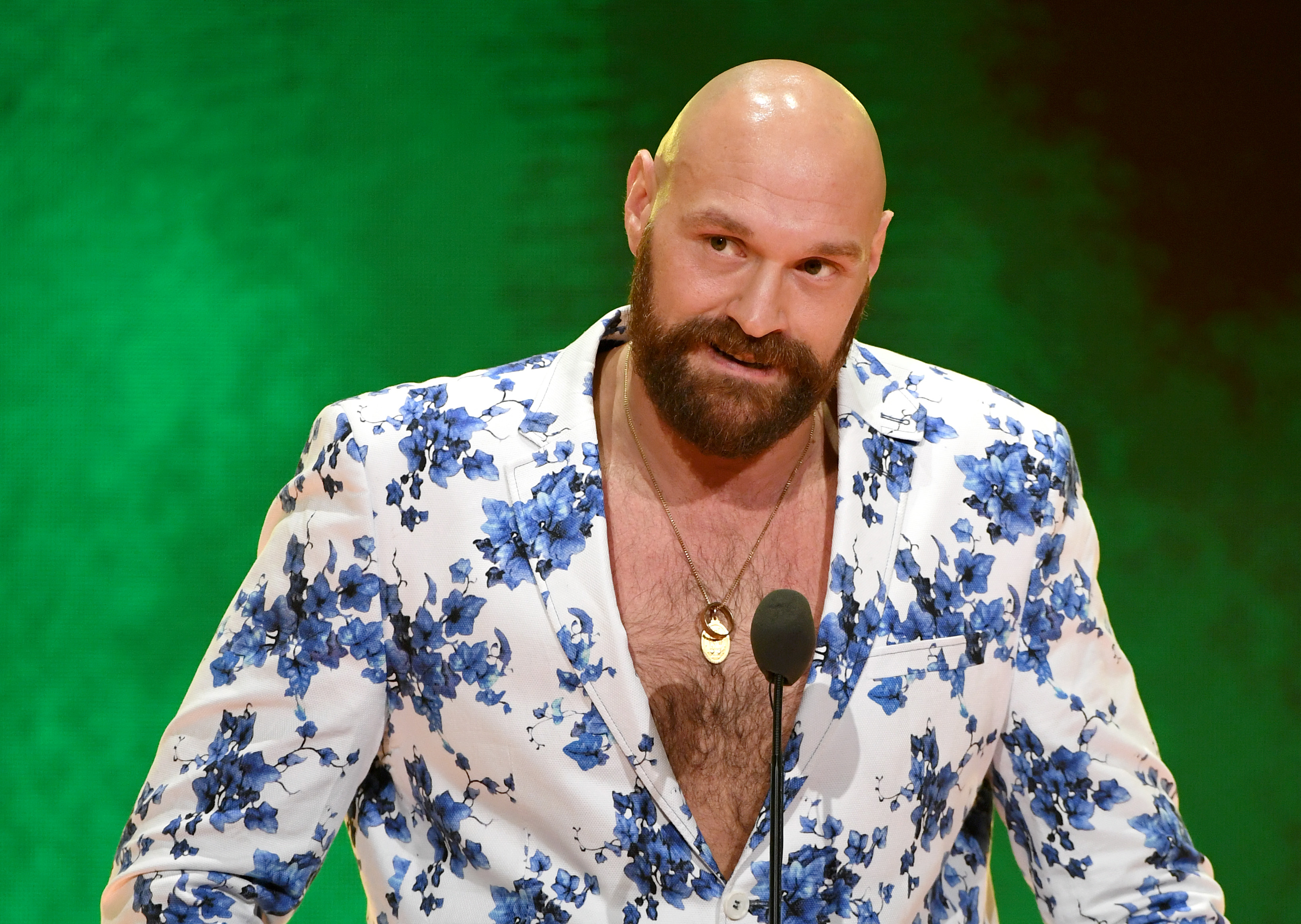 Tyson Fury speaking at a WWE news conference