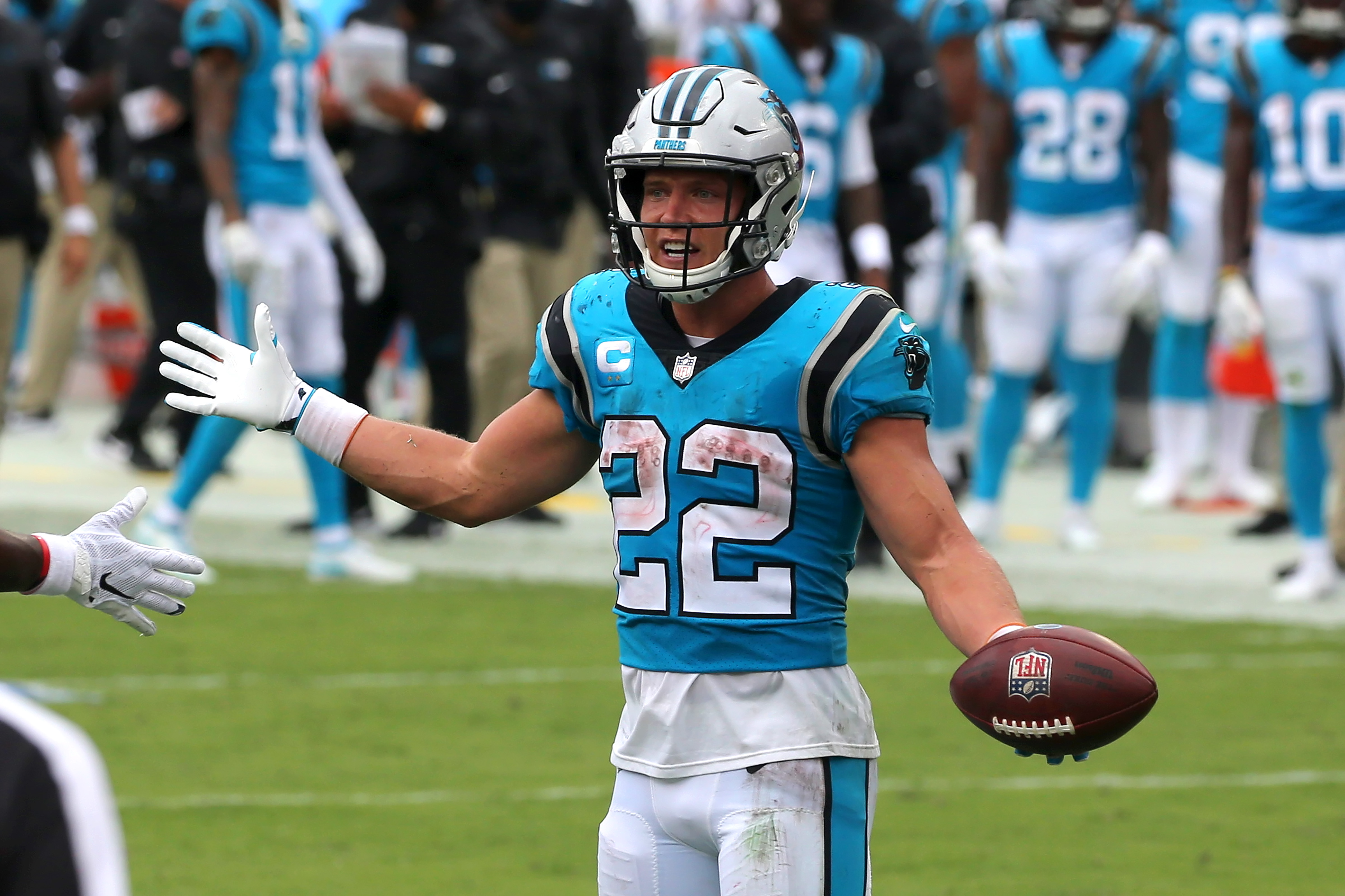 Christian McCaffrey looks to the sideline after a play