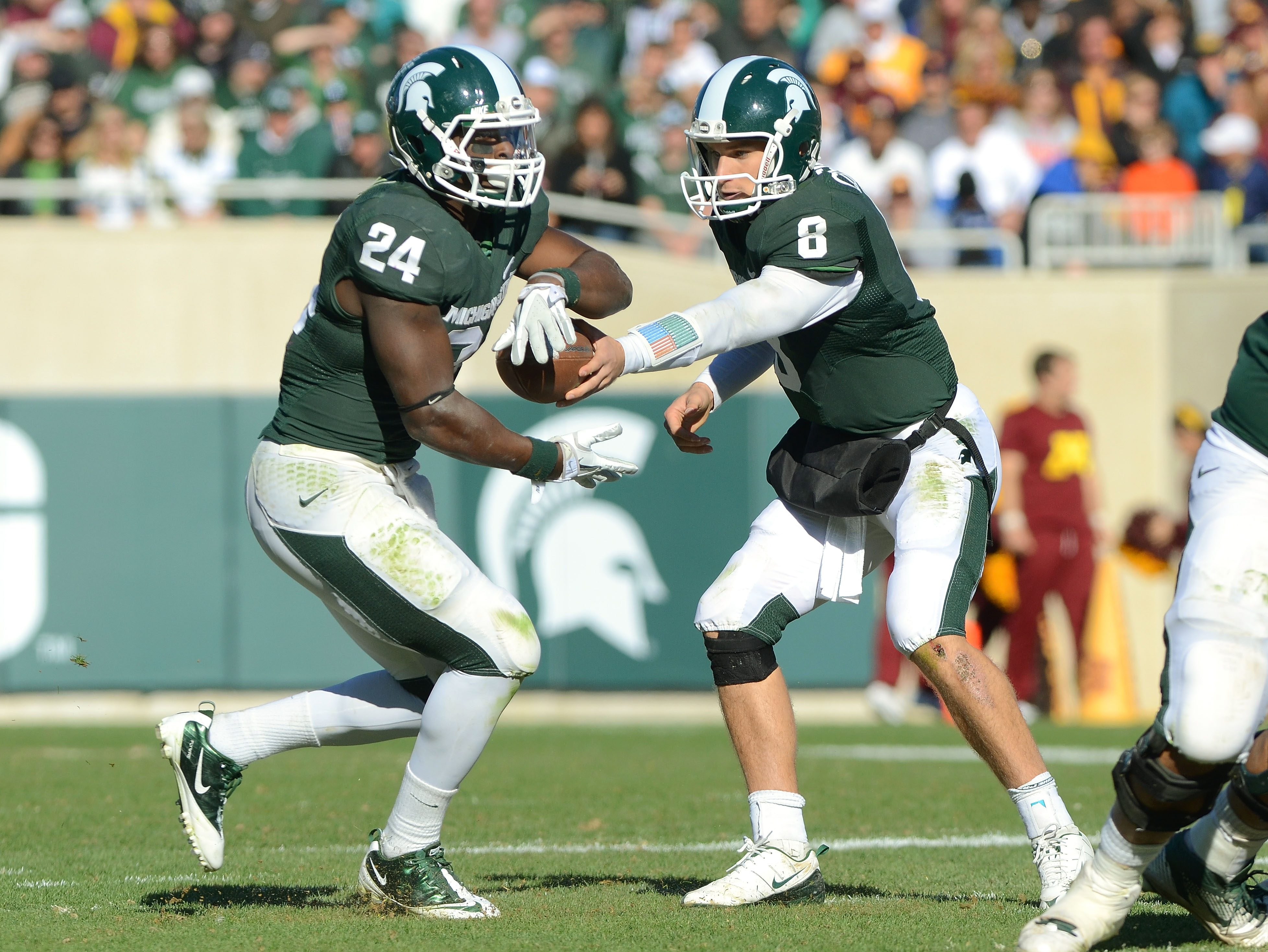 Michigan State Spartans' Kirk Cousins and Le'Veon Bell
