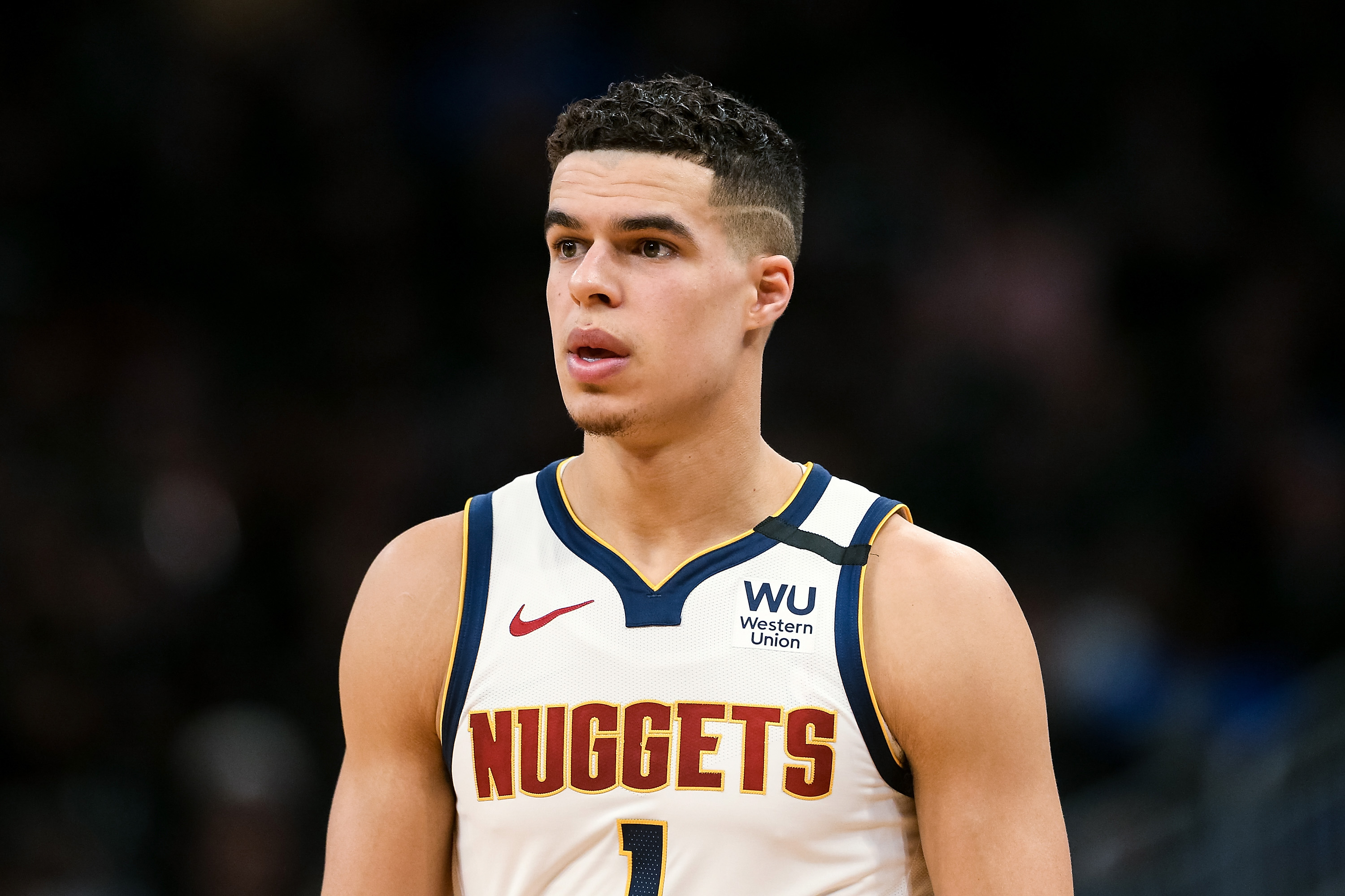 Michael Porter Jr. walking back down the court during a Nuggets game