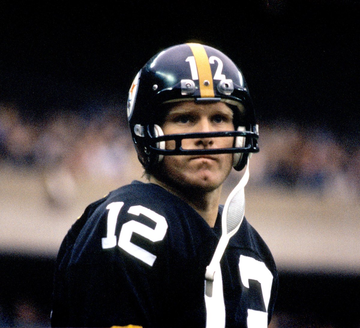 Quarterback Terry Bradshaw Of The Pittsburgh Steelers Looks On From 32E