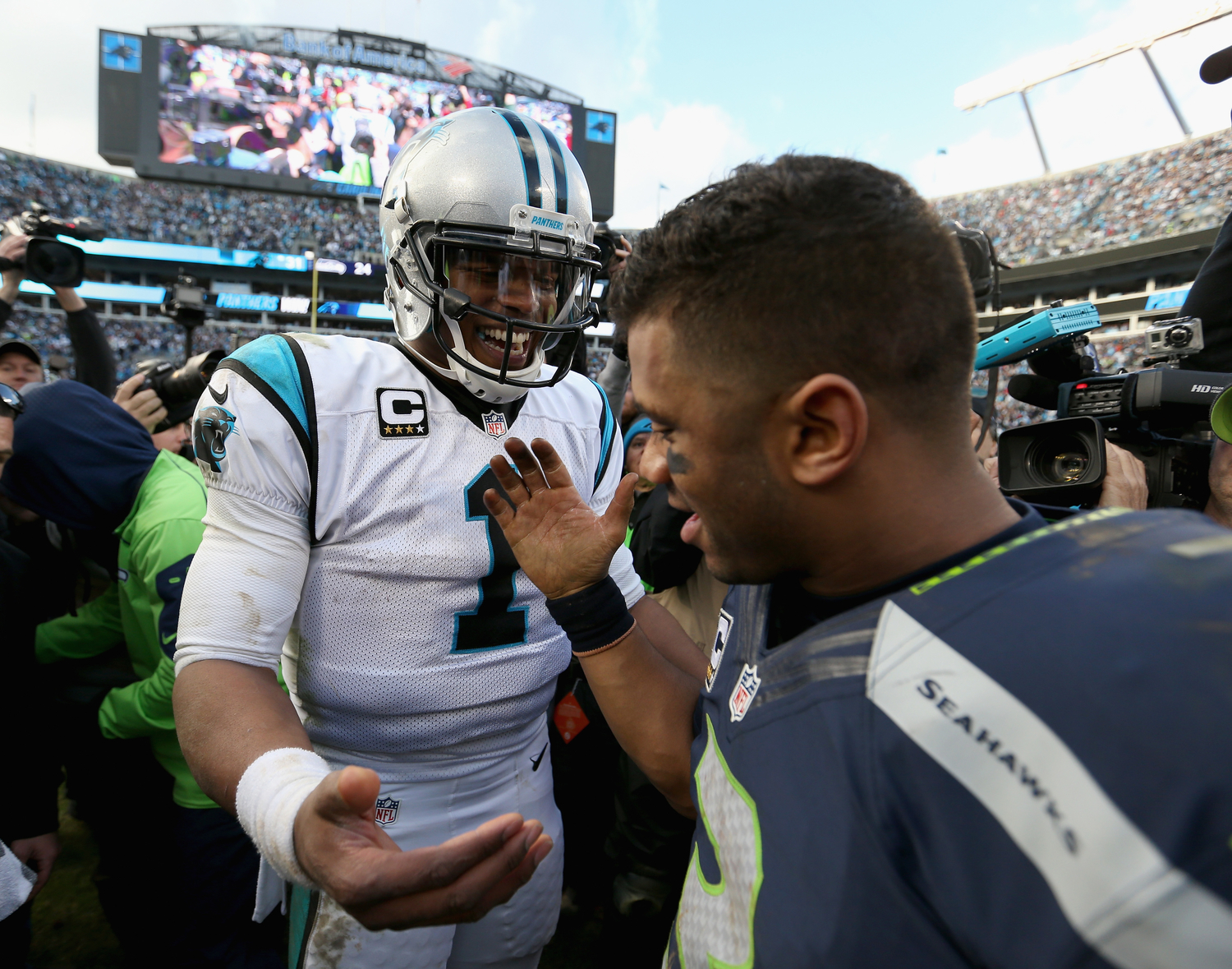 Cam Newton already accomplished the only achievement missing from Russell Wilson's resume, but the Seahawks QB still beats the Patriots star where it matters most with his $140 million contract and Super Bowl ring.