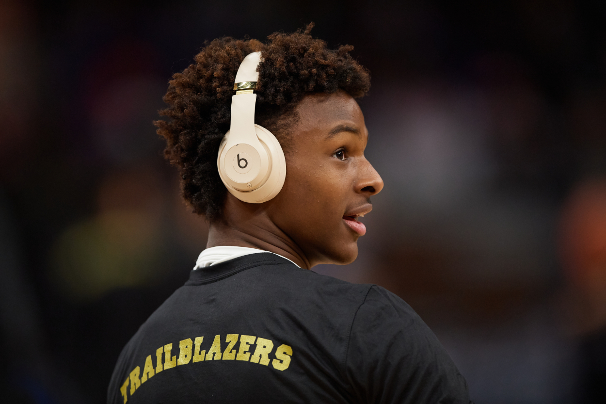 Bronny James looks on during warm ups for a basketball game