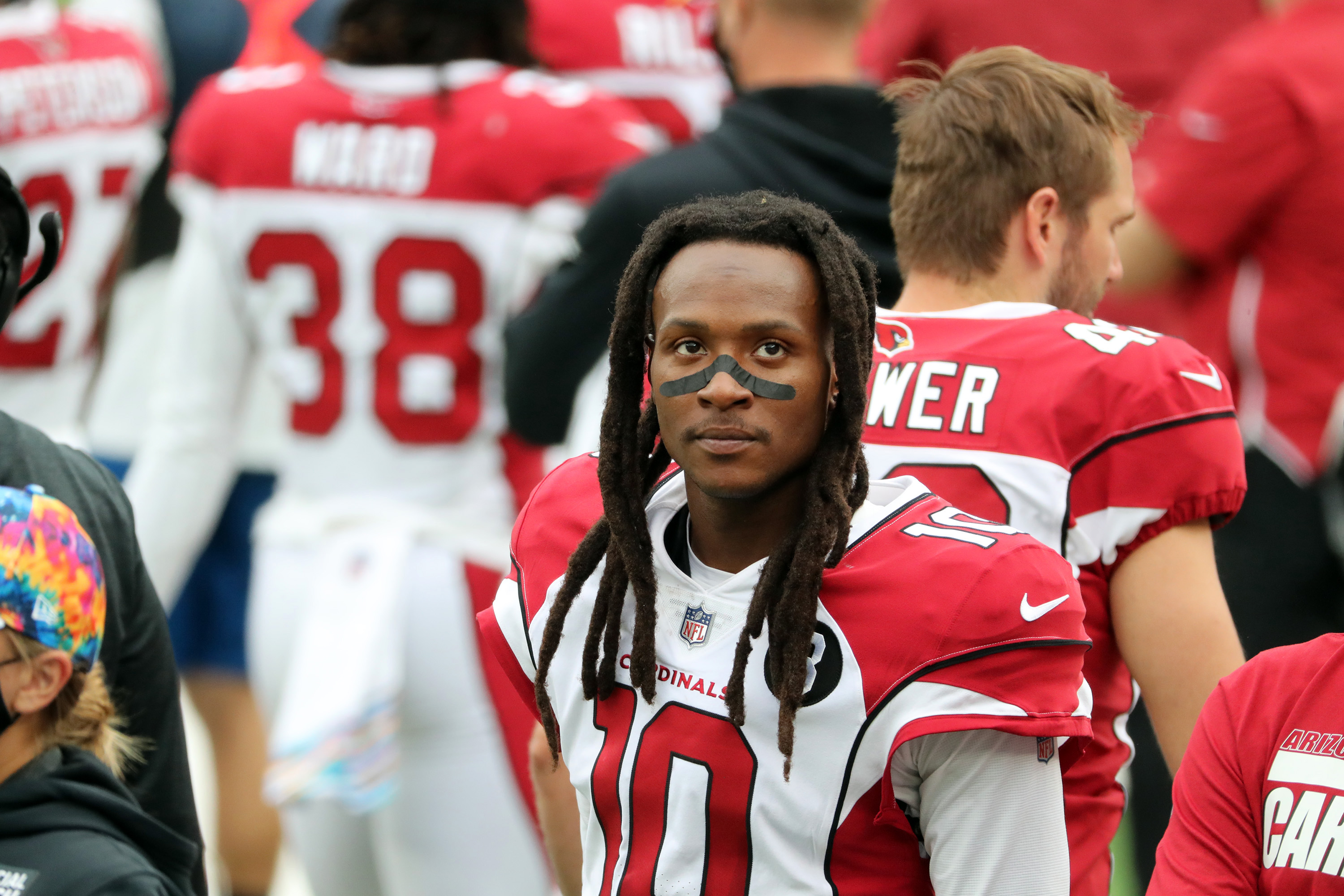 DeAndre Hopkins looks on from the sideline during a game