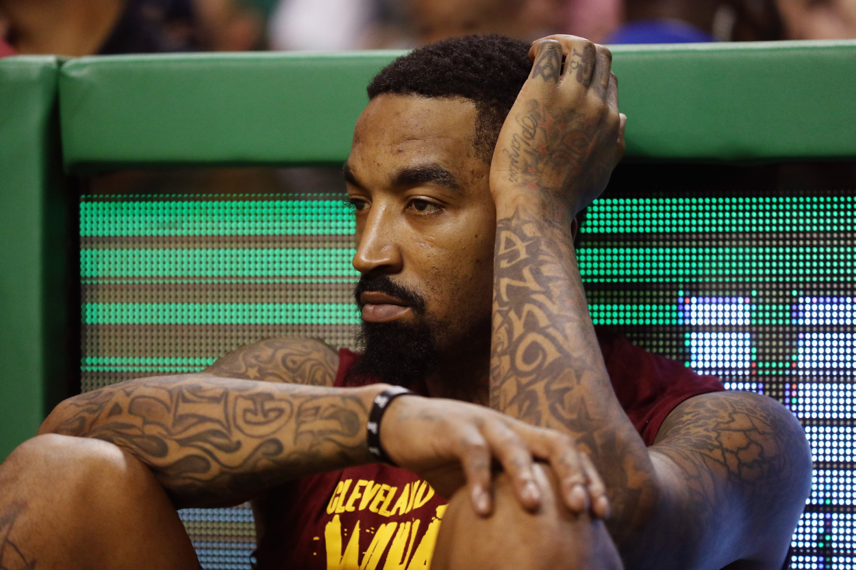 J.R. Smith waits to check into a game