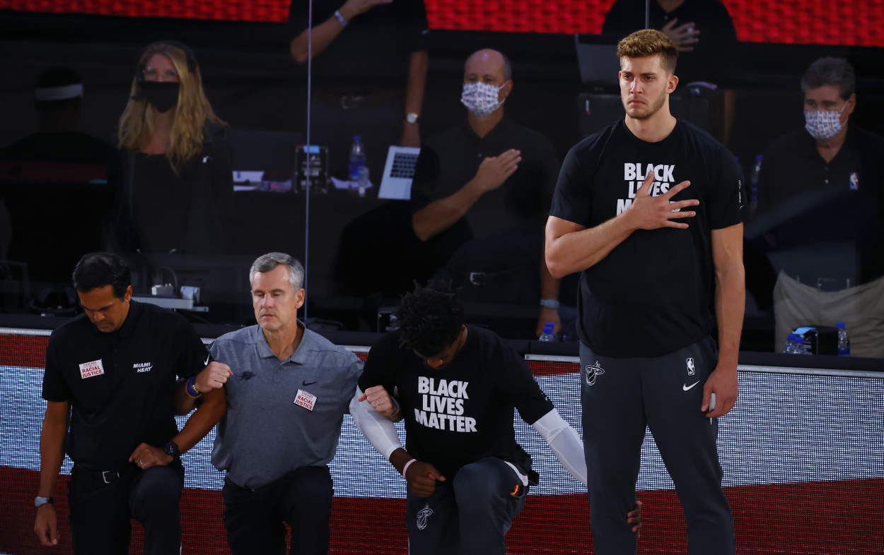 Meyers Leonard stands during the national anthem before a Miami Heat game
