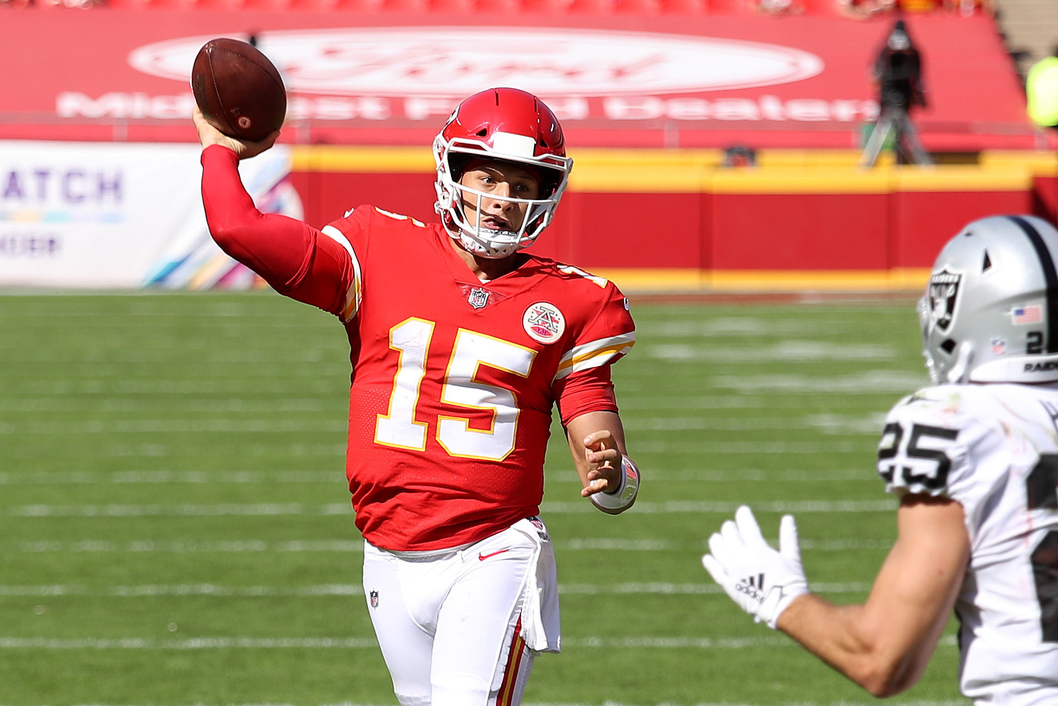 Patrick Mahomes throwing a touchdown pass