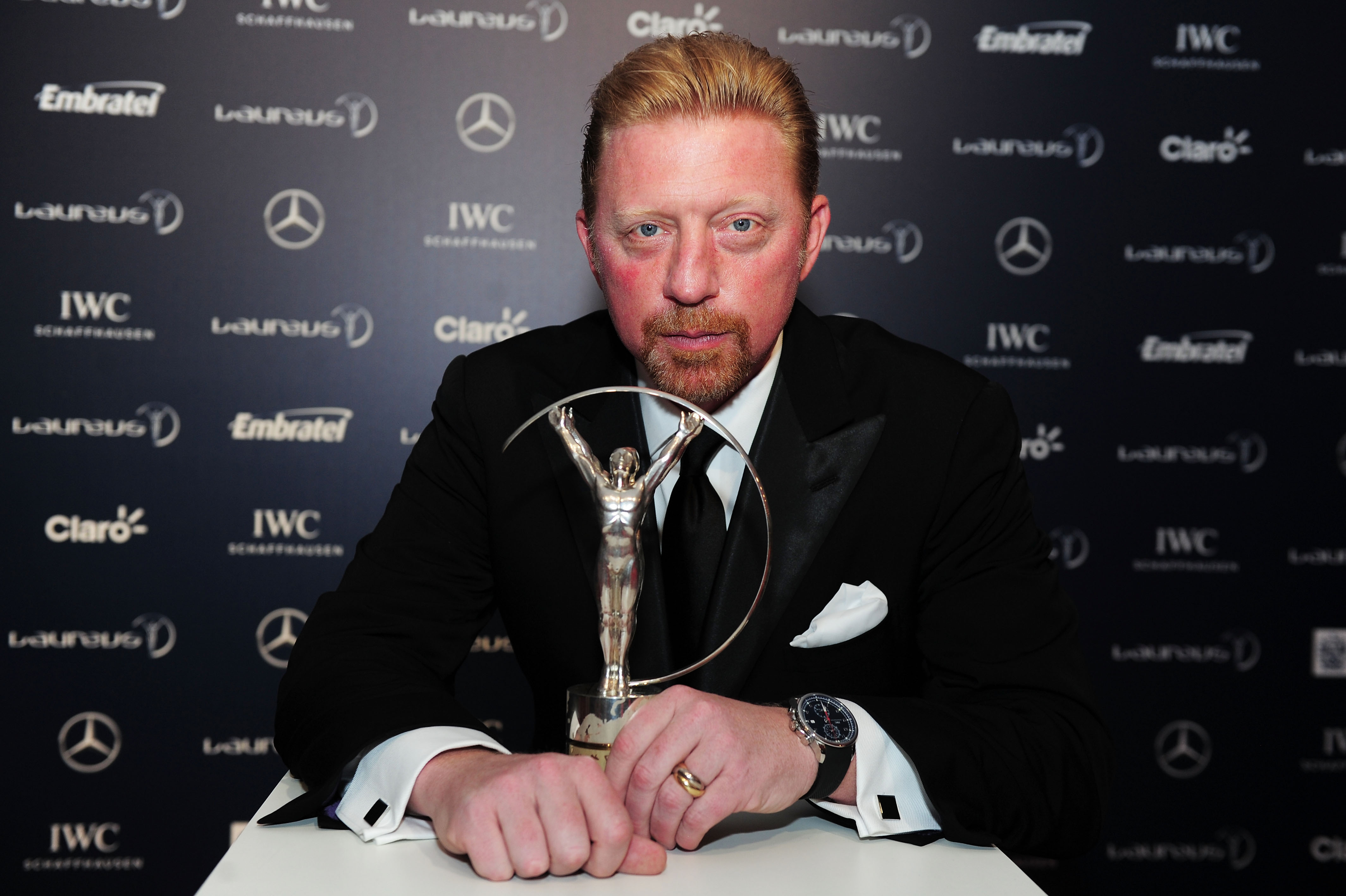 Boris Becker poses with the trophy at the 2013 Laureus World Sports Awards