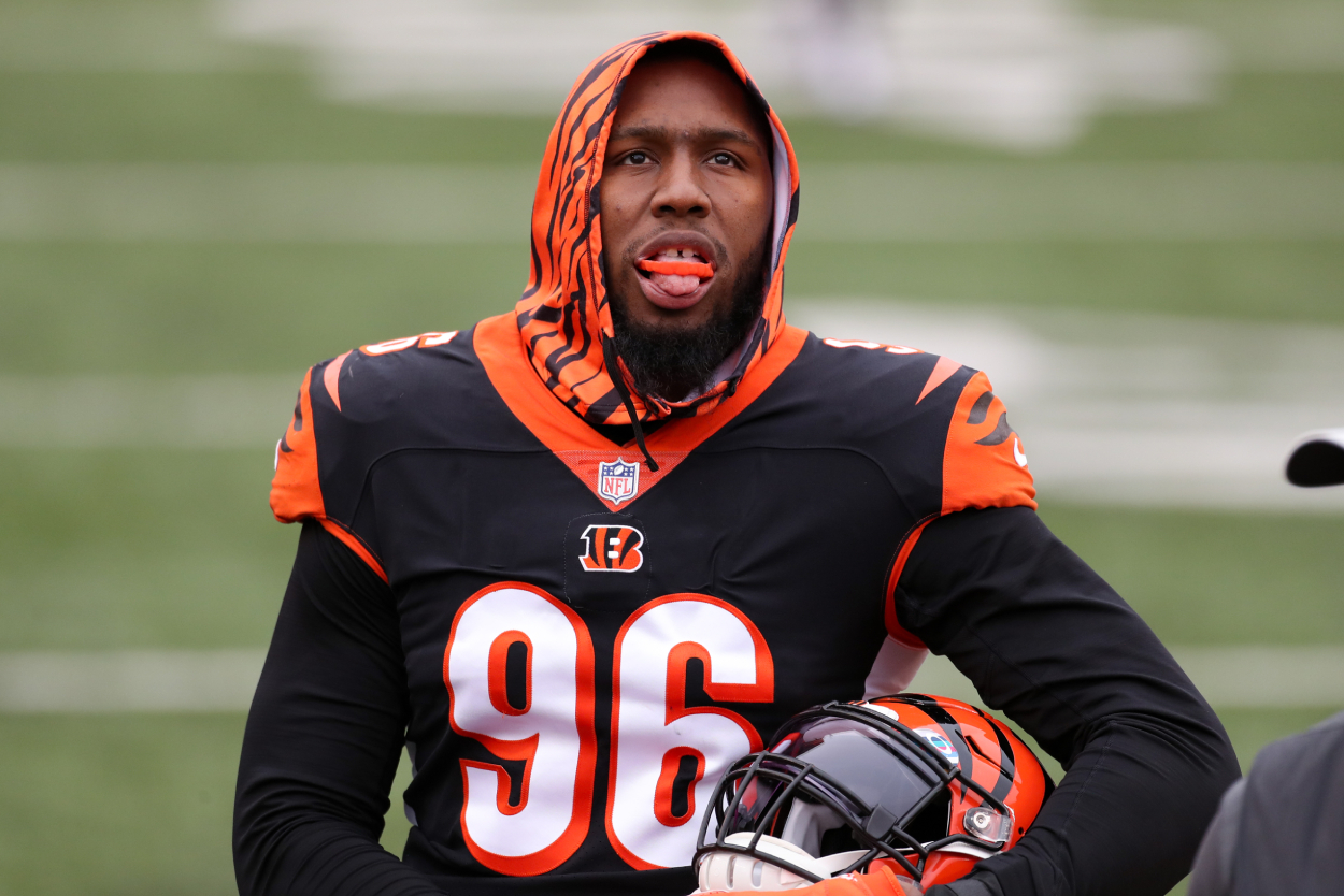 Carlos Dunlap looks on from the sideline during a Bengals game