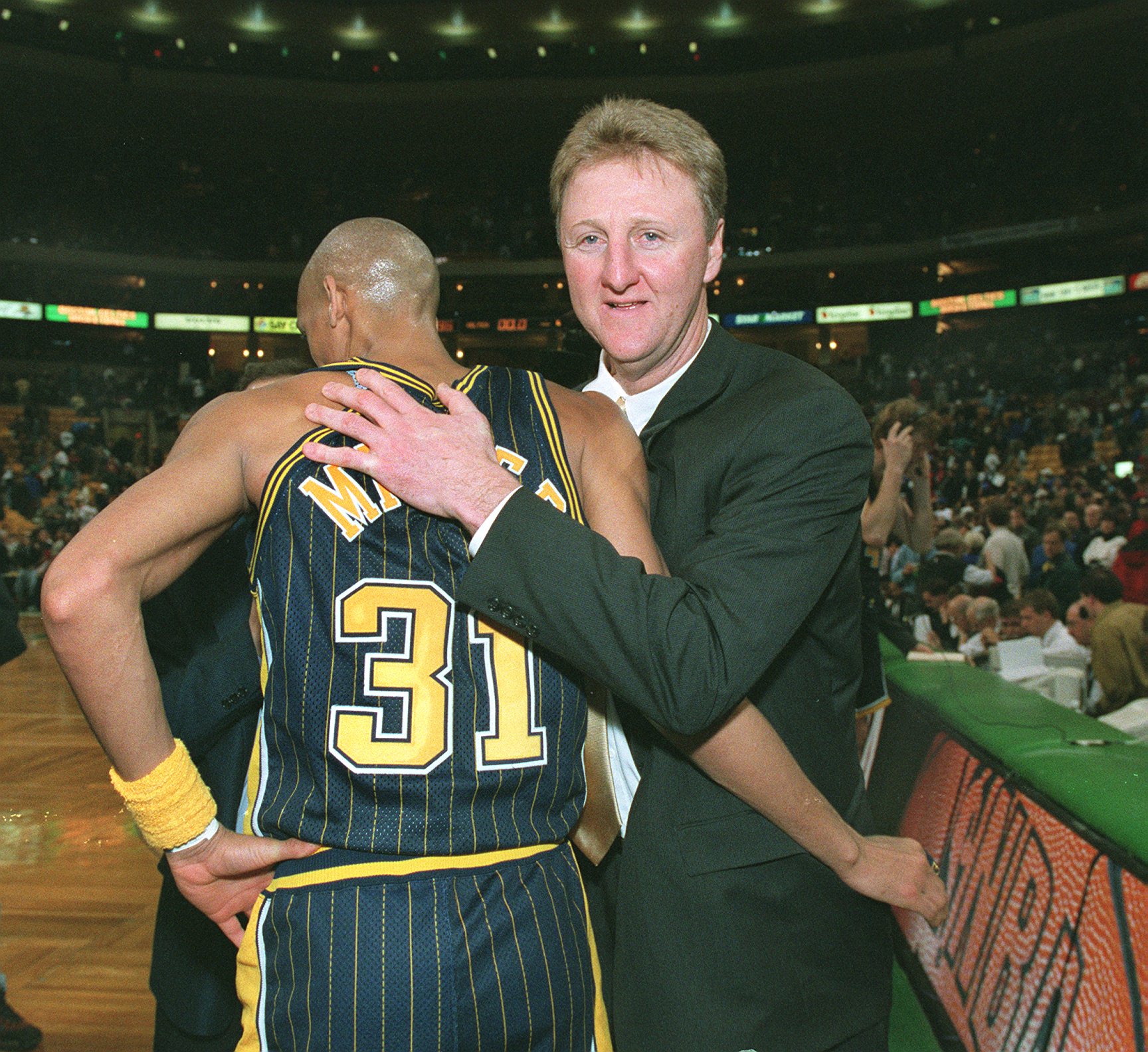 Larry Bird's greets Reggie Miller