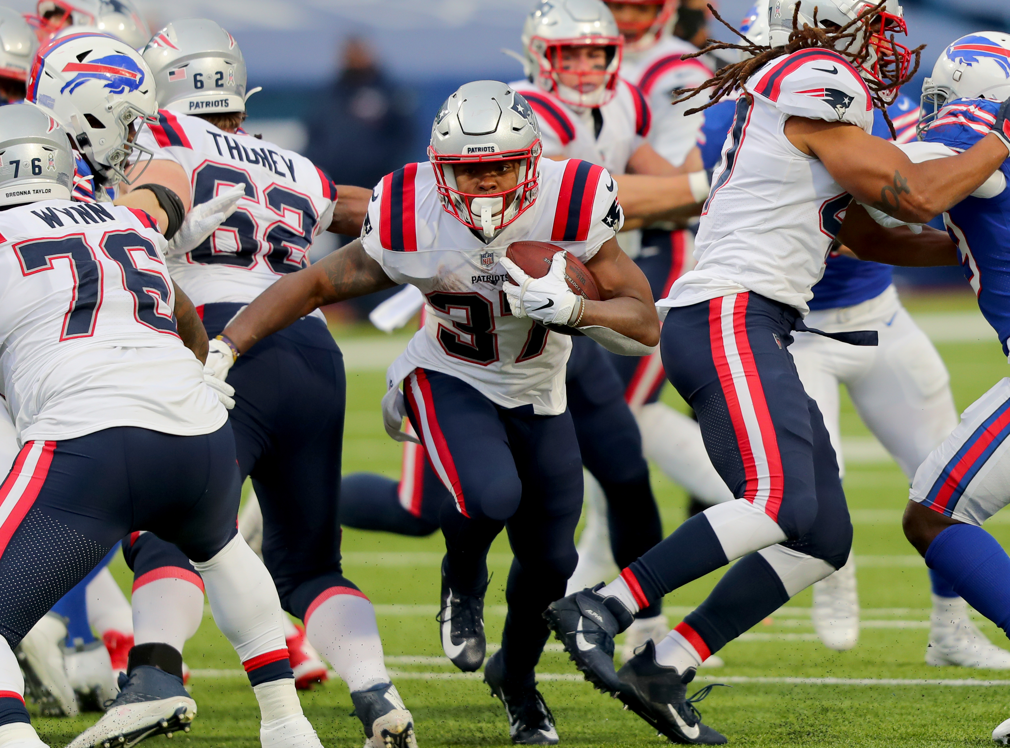 Damien Harris of the New England Patriots runs the ball