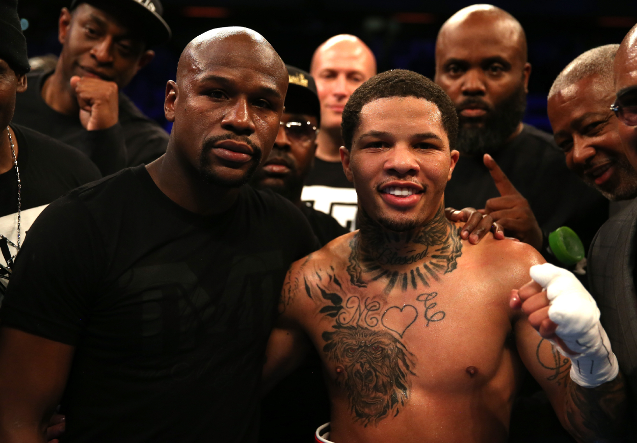 Gervonta Davis and Floyd Mayweather pose together after a fight