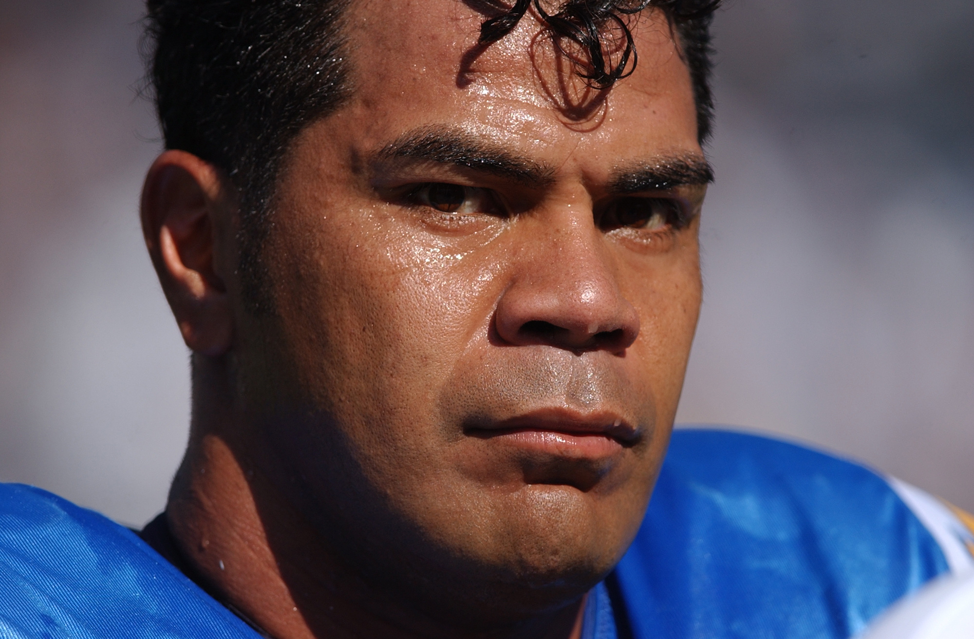 Junior Seau looks on during a Chargers game