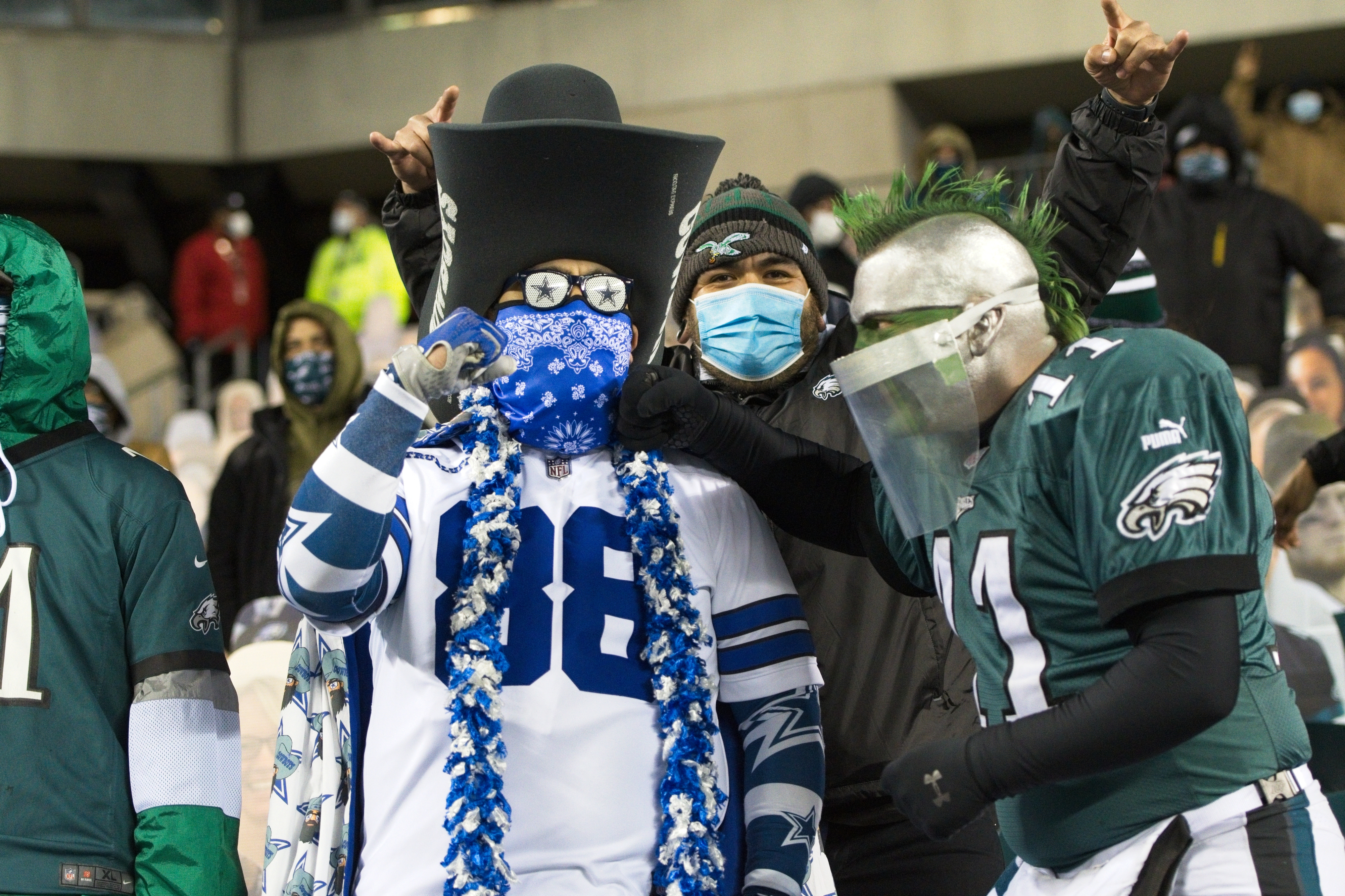 Eagles and Cowboys fans celebrate during a game