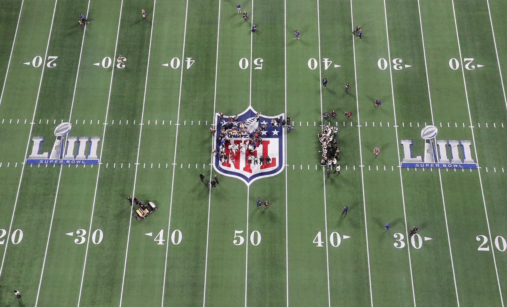 How Do Networks Show the First-Down Line on Televised Football Games?