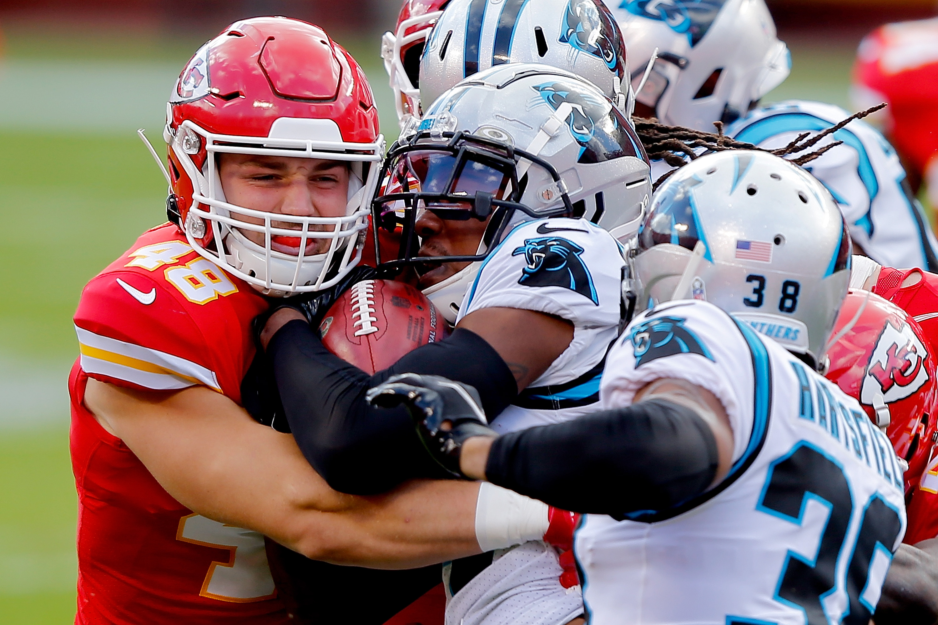 Nick Keizer of the Kansas City Chiefs tackles Pharoh Cooper of the Carolina Panthers