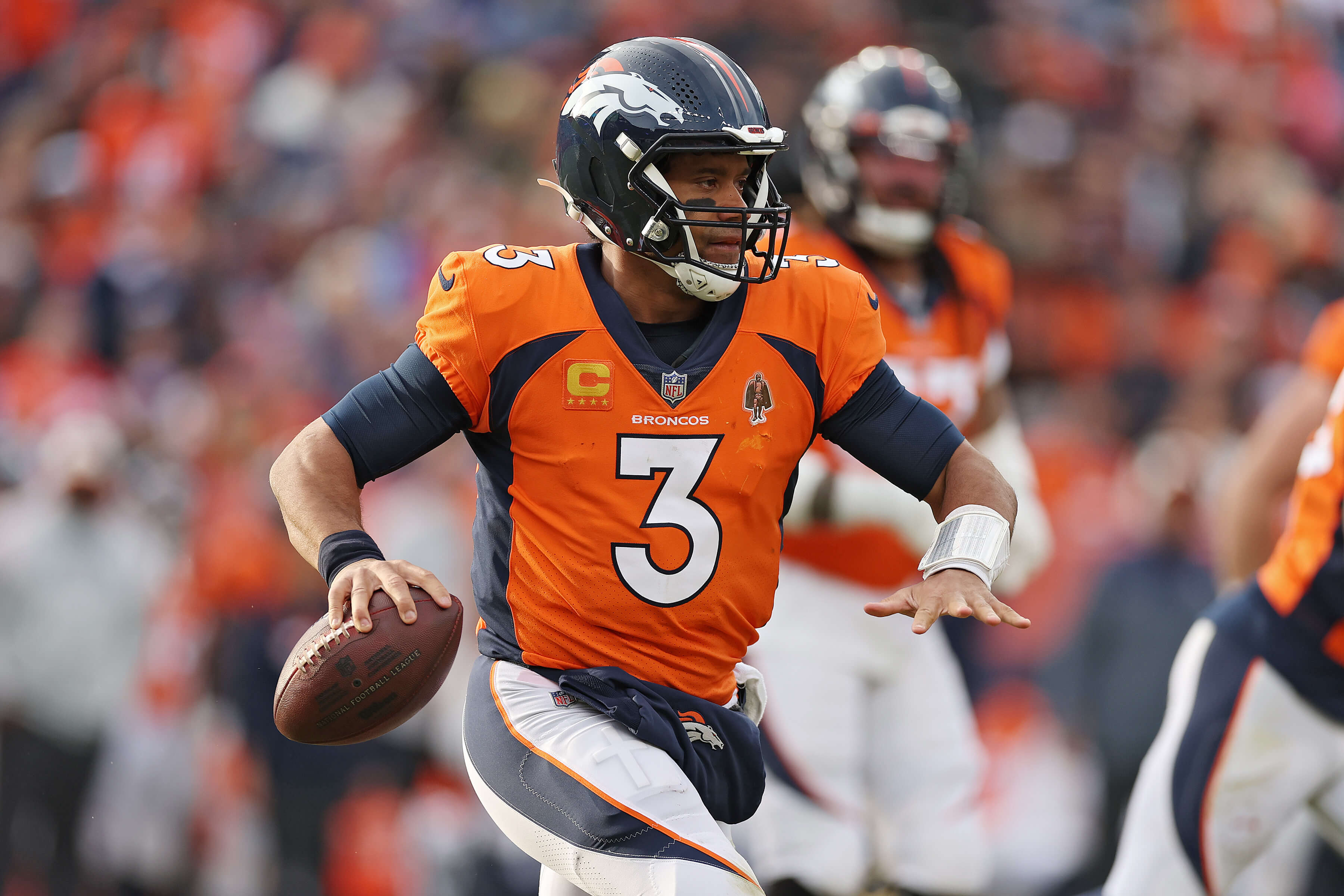 Russell Wilson of the Denver Broncos attempts a pass.