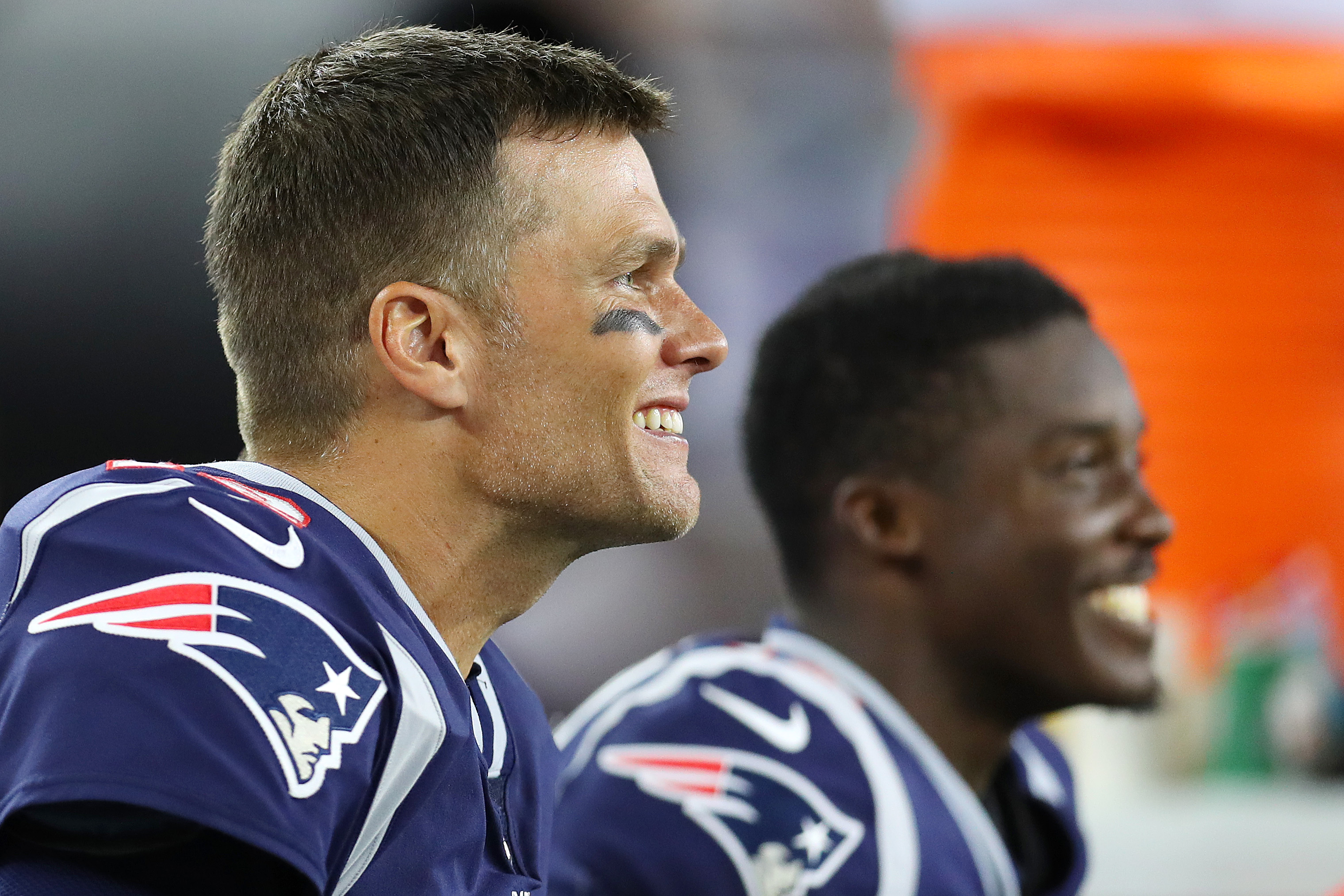 Tom Brady of the New England Patriots laughs