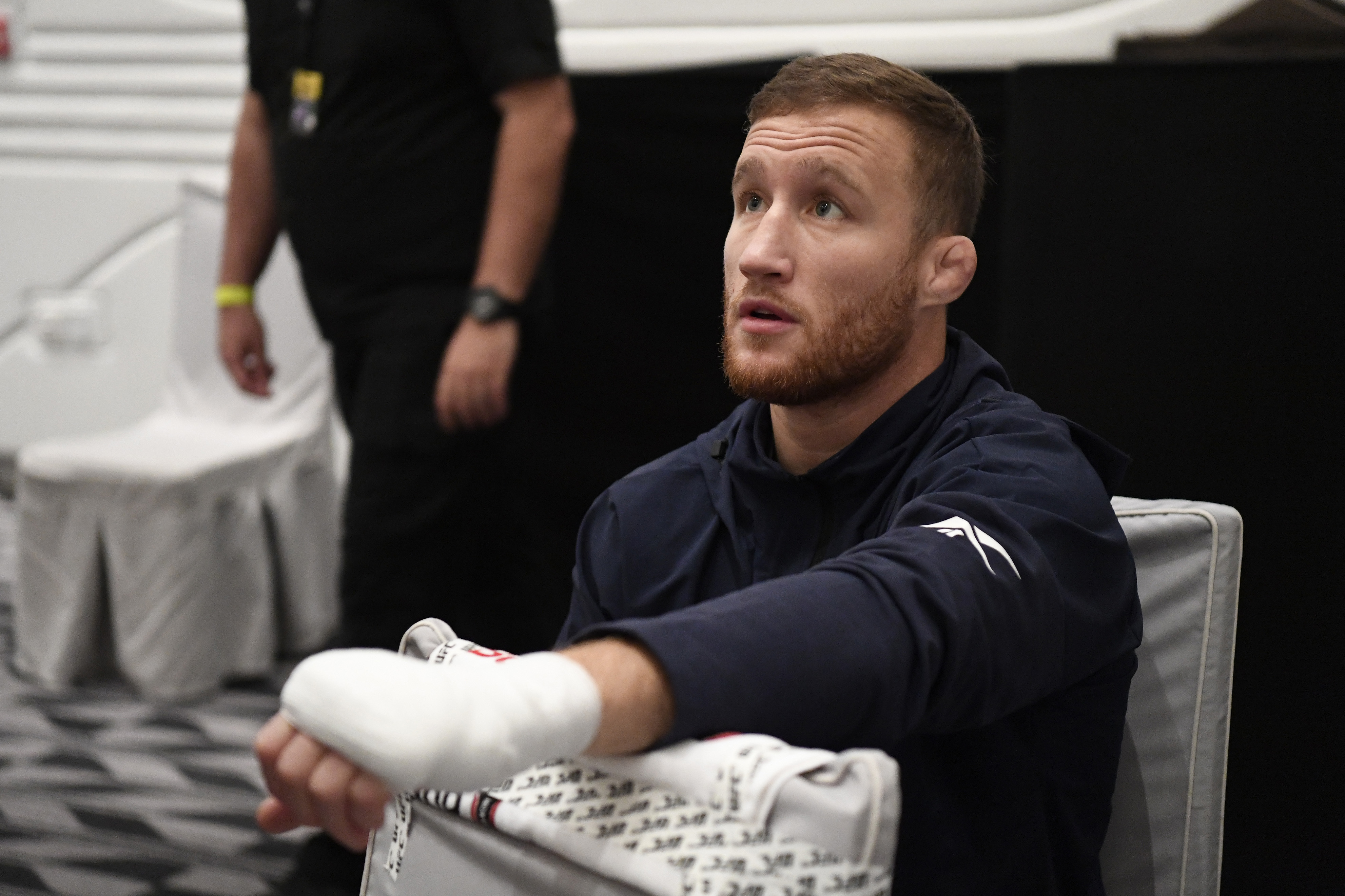Justin Gaethje has his hands wrapped backstage during UFC 254