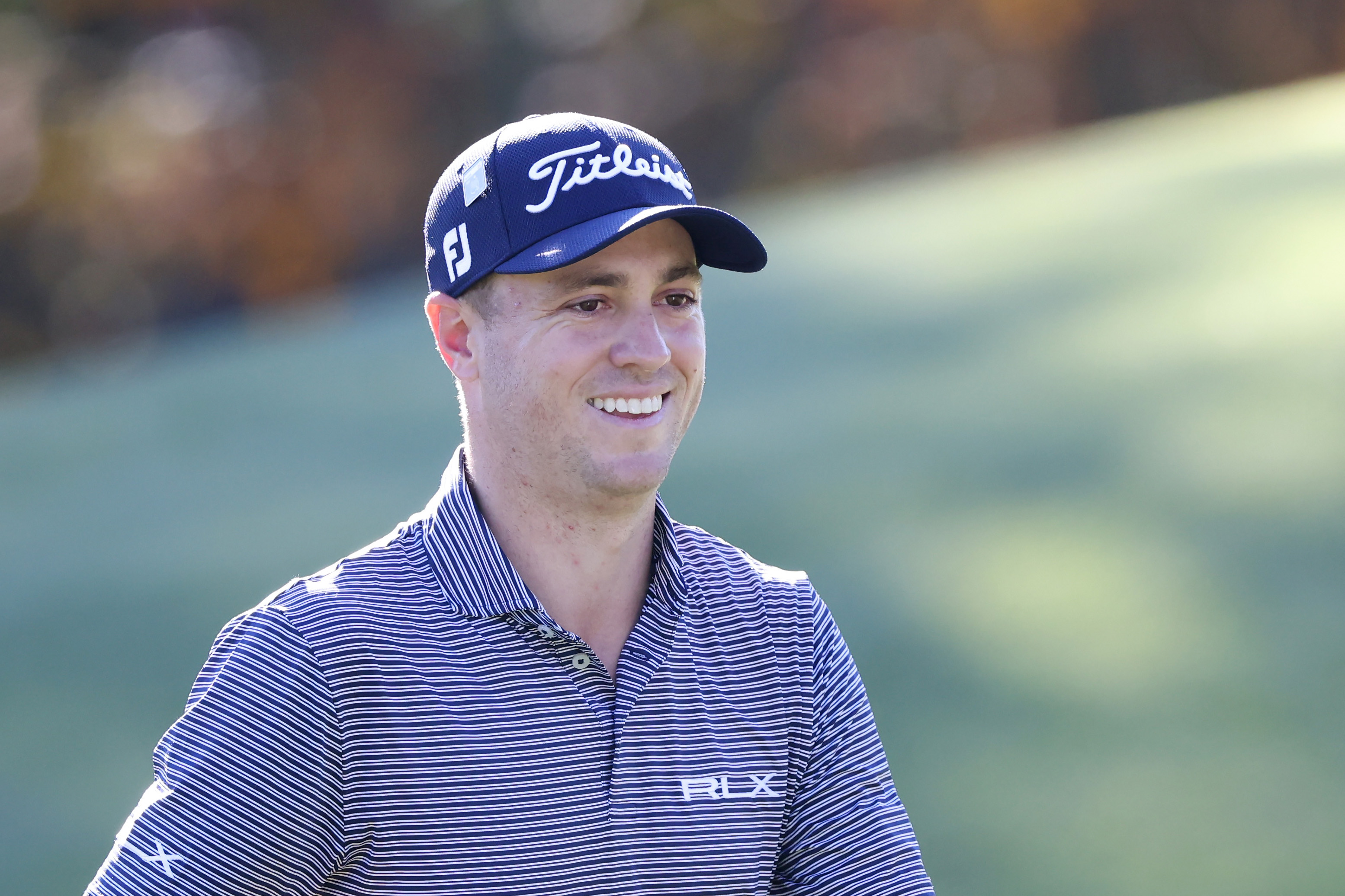 Justin Thomas’s Golf Closet Is Laughably Full of Polo Shirts