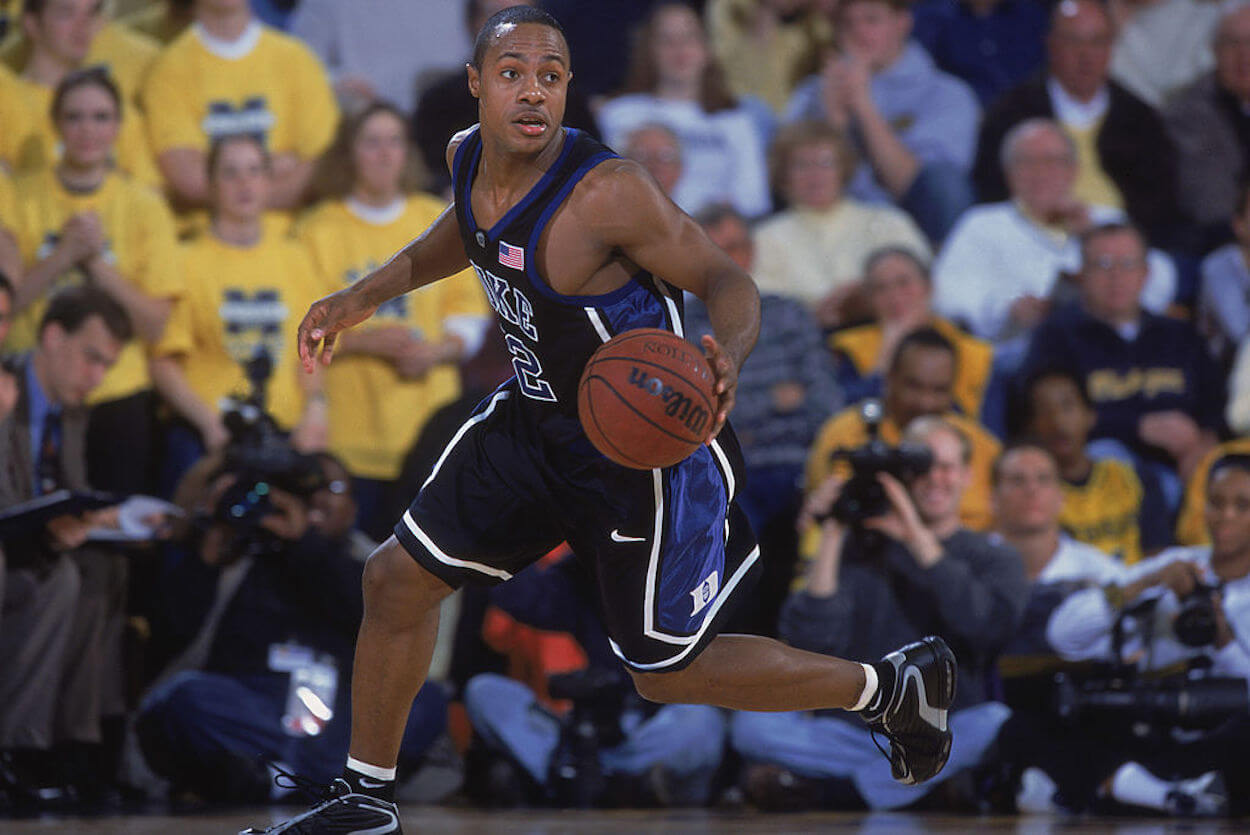 Jay Williams, who was then known as Jason Williams, dribbles the ball during his time at Duke.