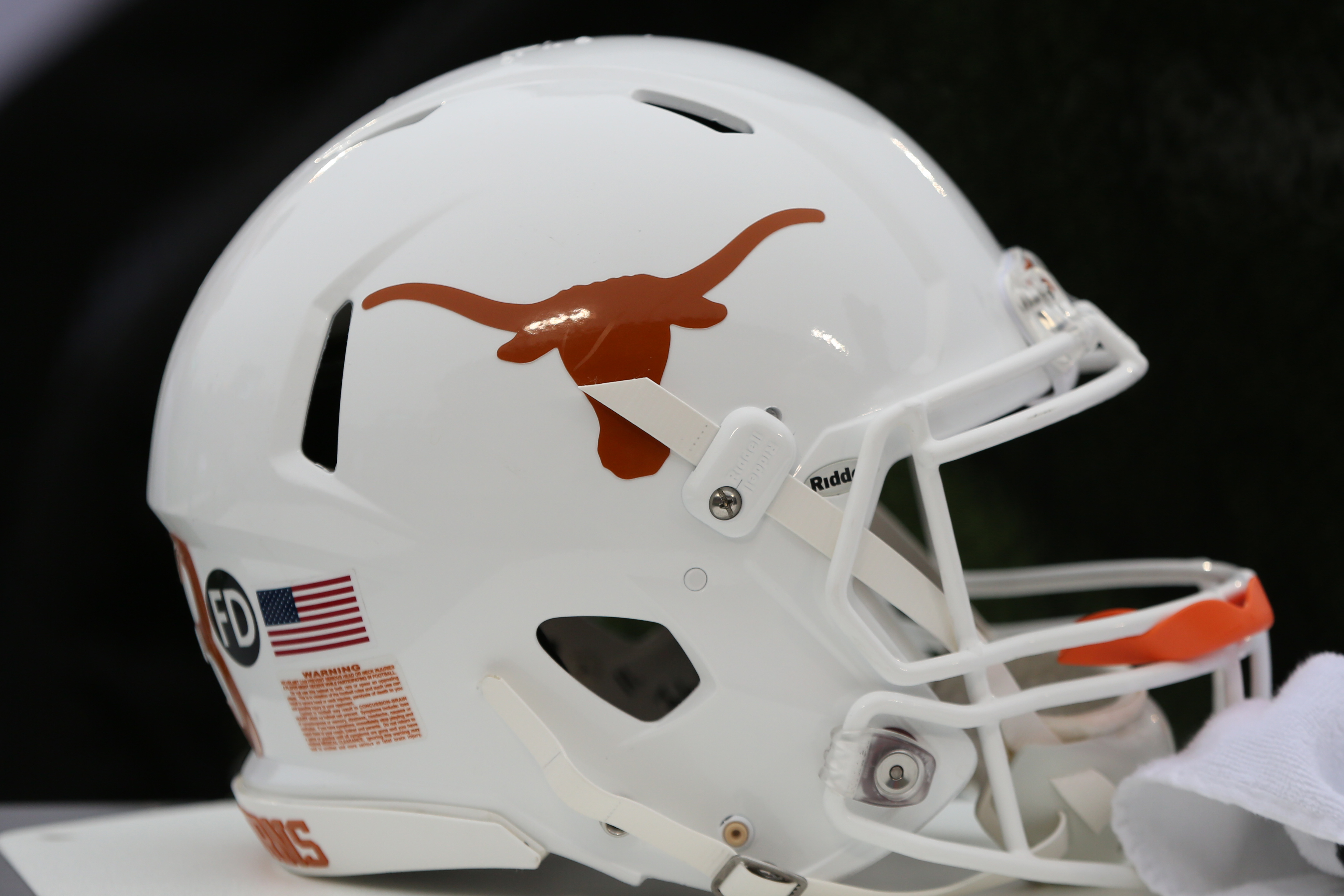 What Does the ‘FA’ Sticker Stand For on the Back of Texas Longhorns Helmets?