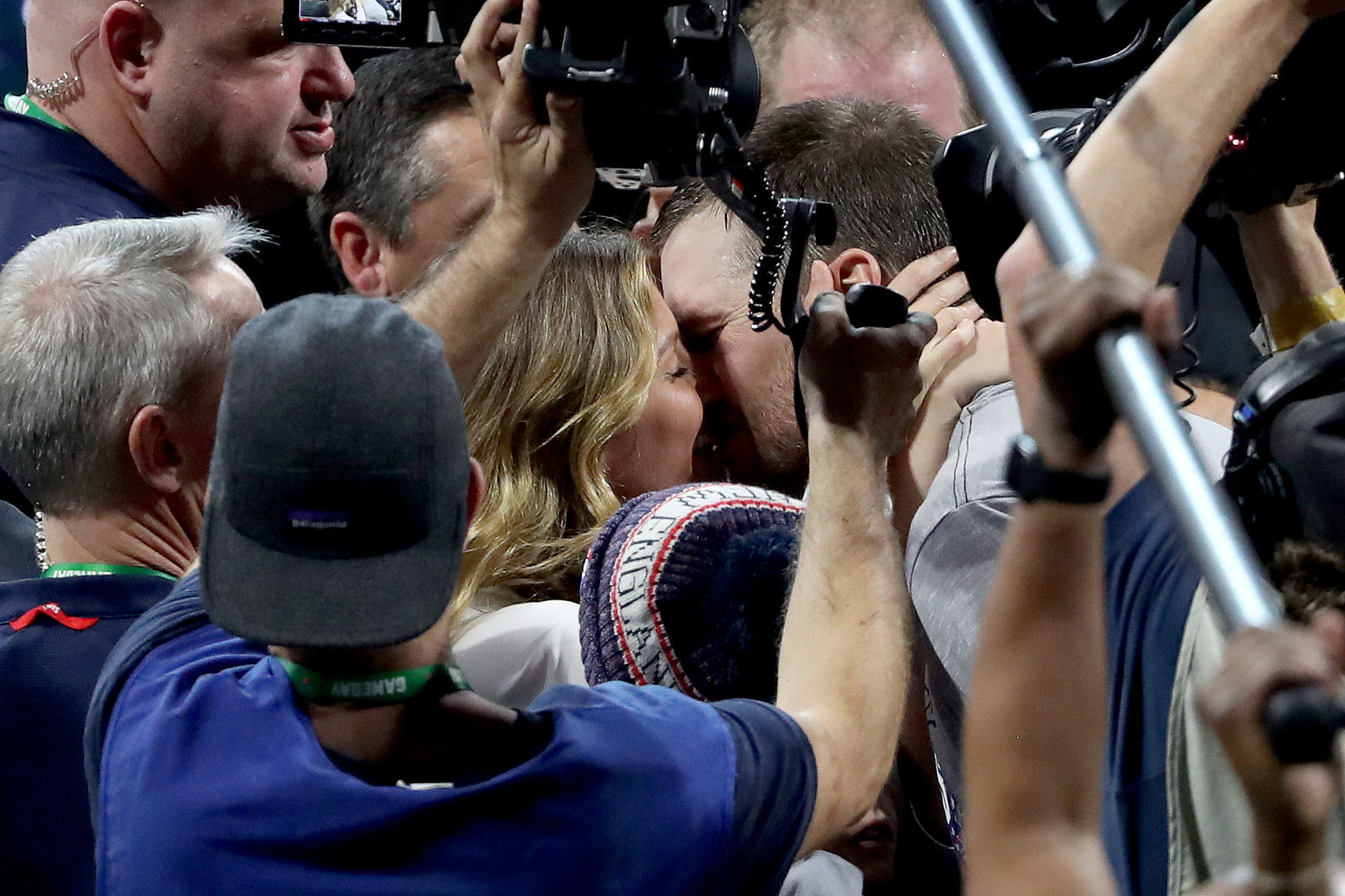 Tom Brady kisses his wife Gisele Bündchen after Super Bowl LIII