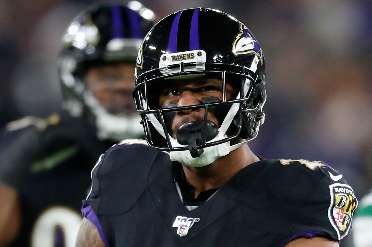 Marcus Peters looks on during a Ravens game