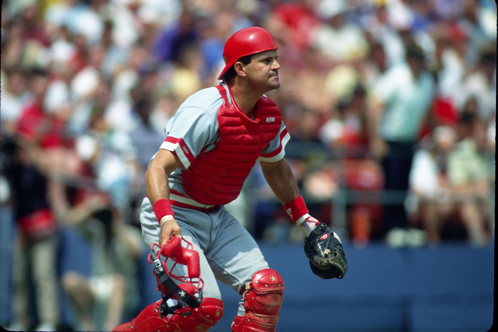 Bo Diaz runs to field a baseball during a Reds game