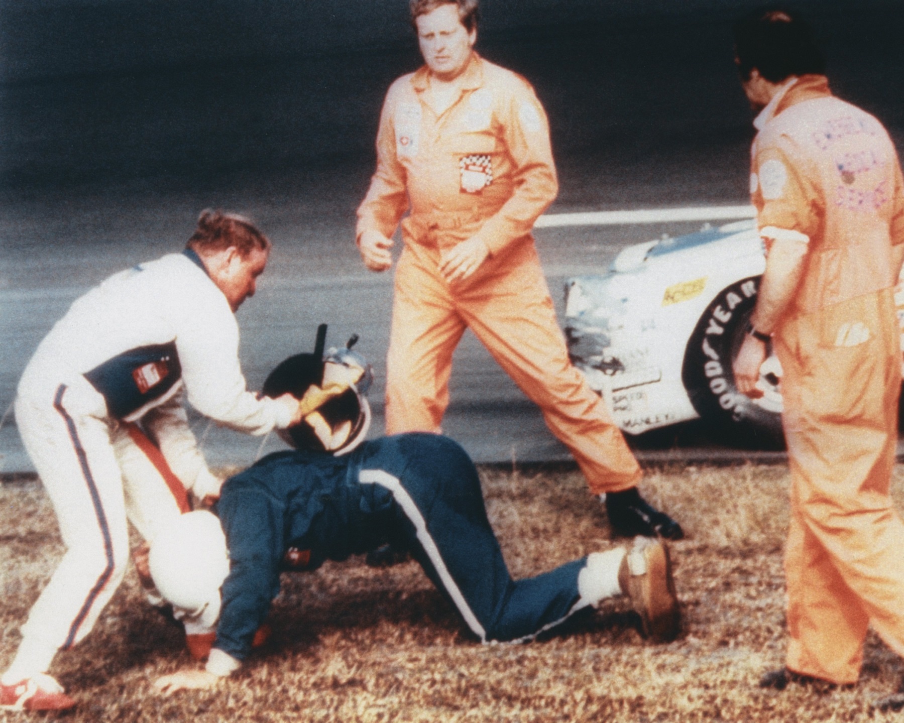 Cale Yarborough hits Bobby Allison with his helmet after the two crashed during the last lap of the 1979 Daytona 500 at Daytona International Speedway.  ISC Archives/CQ-Roll Call Group via Getty Images
