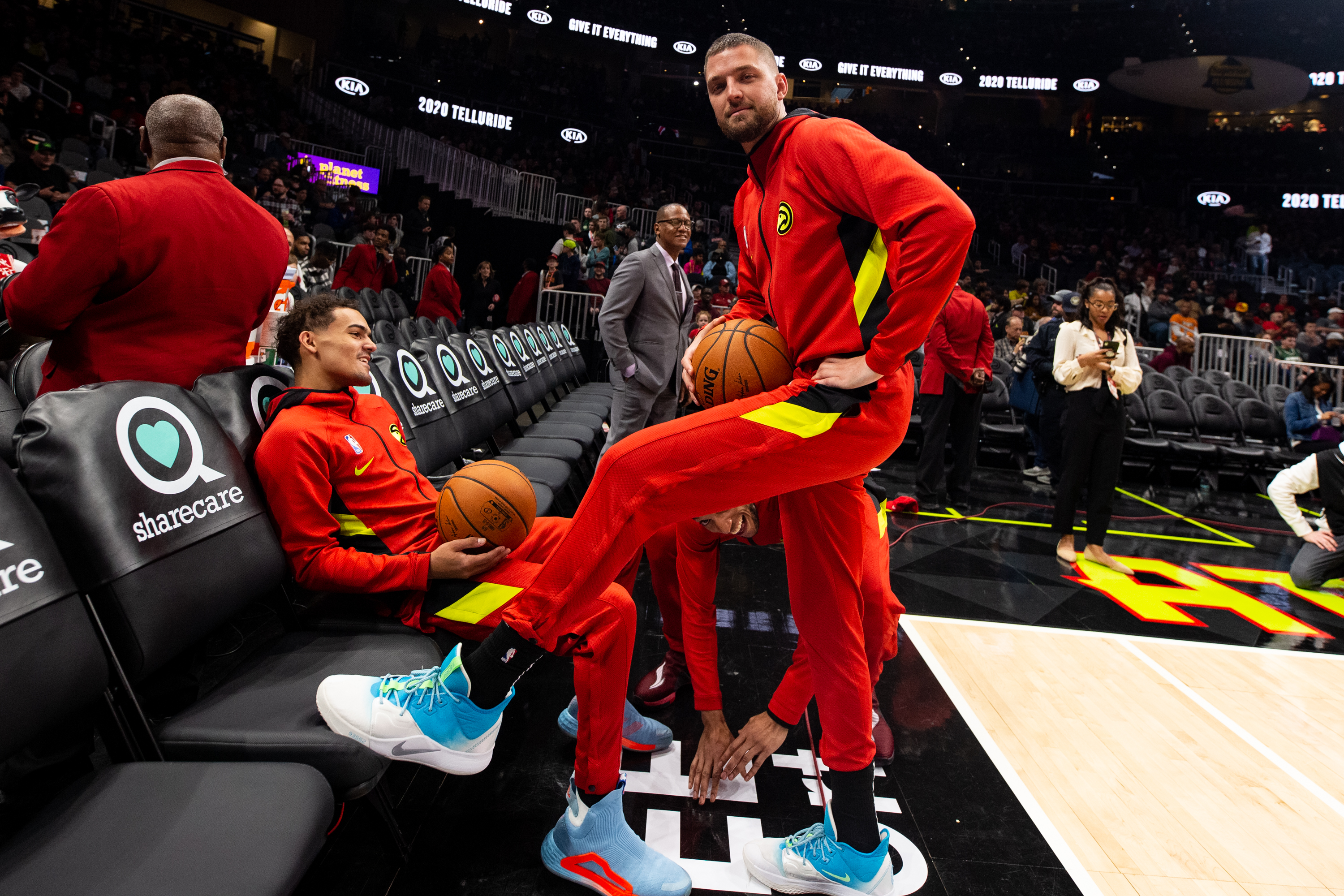 Trae Young and Chandler Parsons of the Atlanta Hawks looks on prior to a game