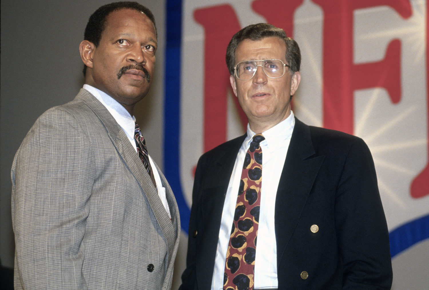 Gene Upshaw poses next to NFL Commissioner Paul Tagliabue