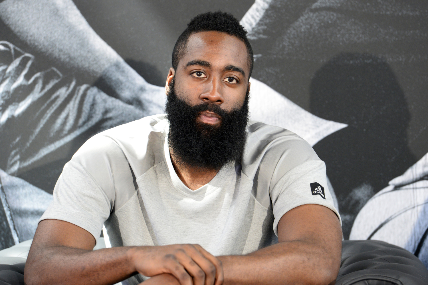 James Harden talks to the media at a press conference