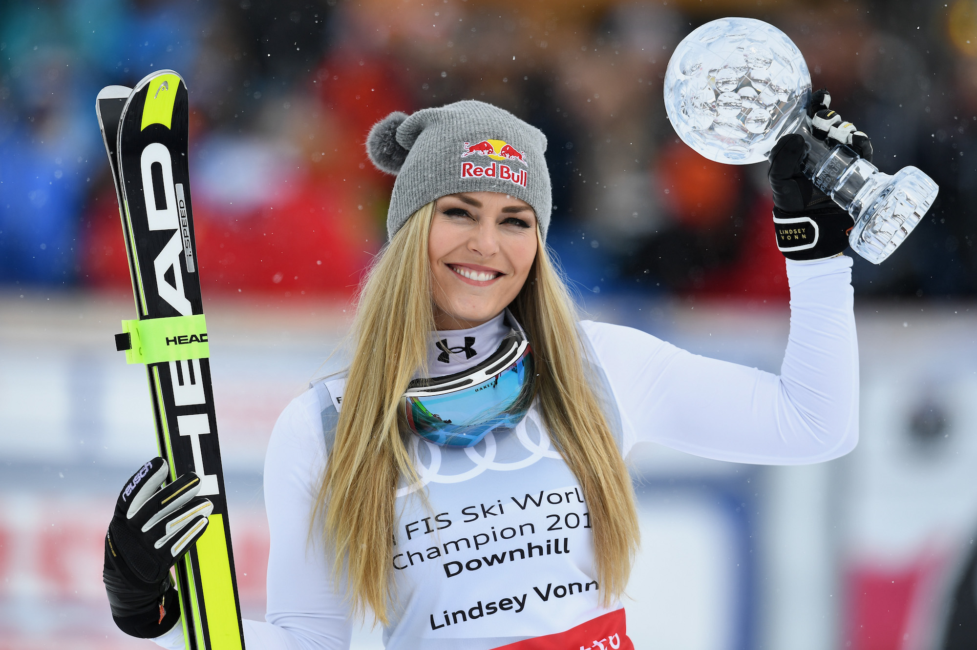 Lindsey Vonn of the USA poses with the Women's World Cup Downhill Crystal Globe trophy after the Women's Downhill Race on March 16, 2016, in St Moritz, Switzerland