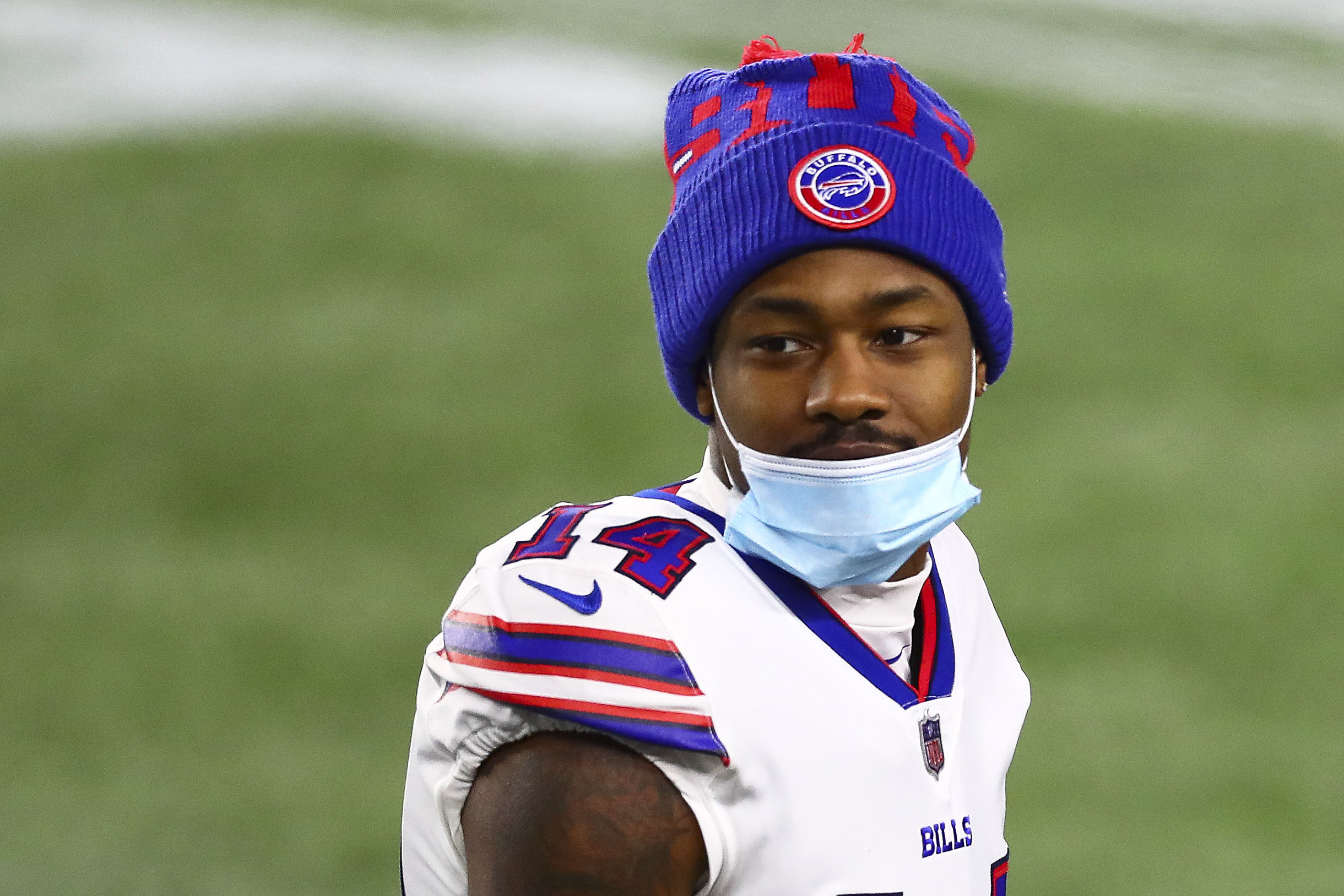 Stefon Diggs of the Buffalo Bills looks on with a face mask