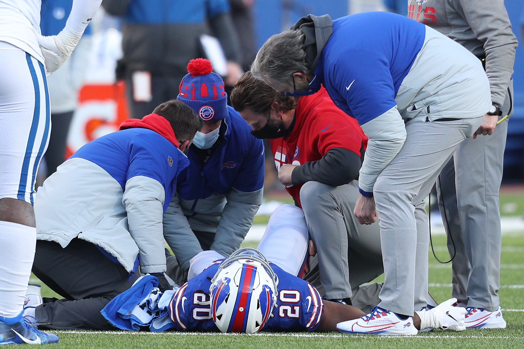 Zack Moss of the Buffalo Bills lies on the field after getting hurt